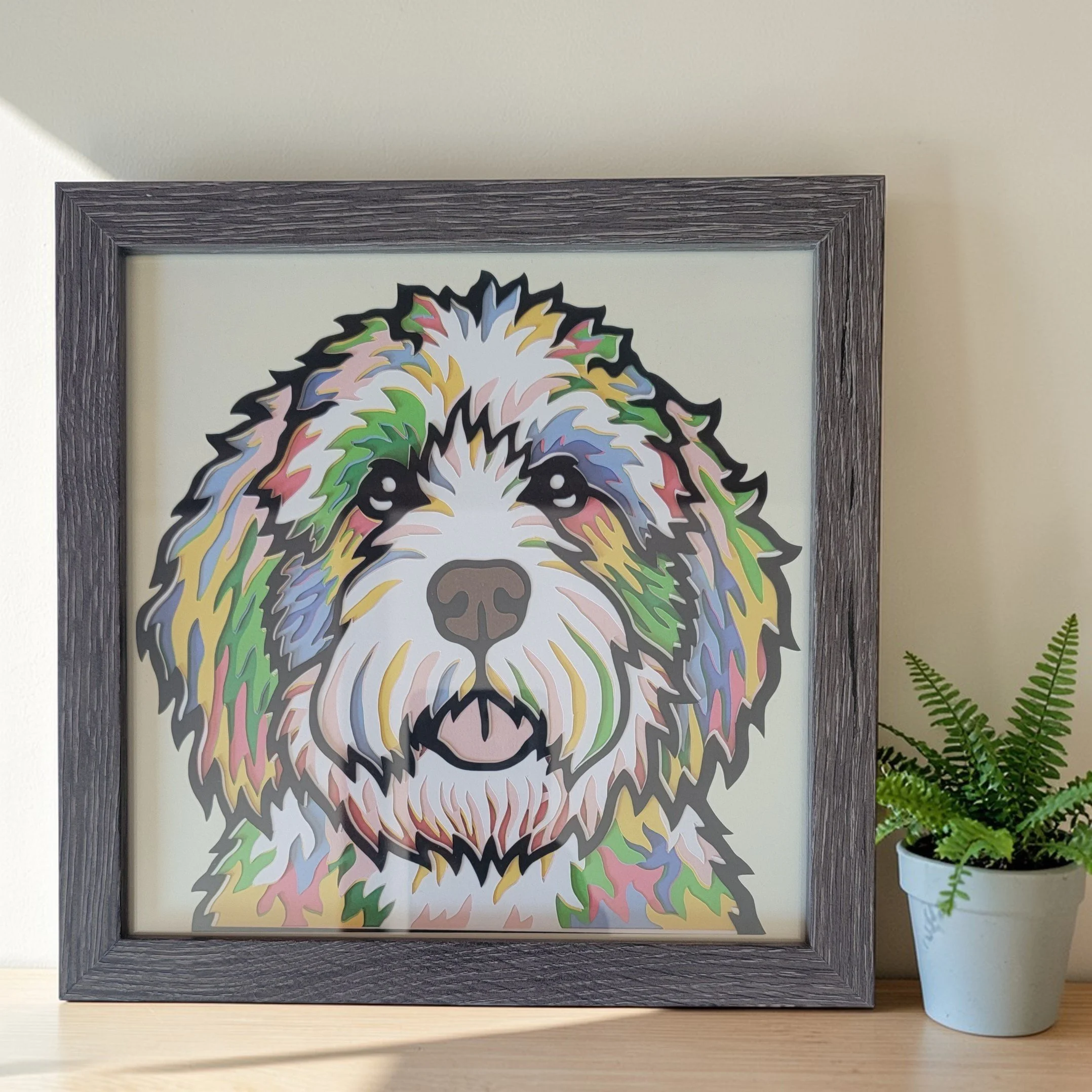 BERNEDOODLE GREY FRAME WITH PLANT.jpg