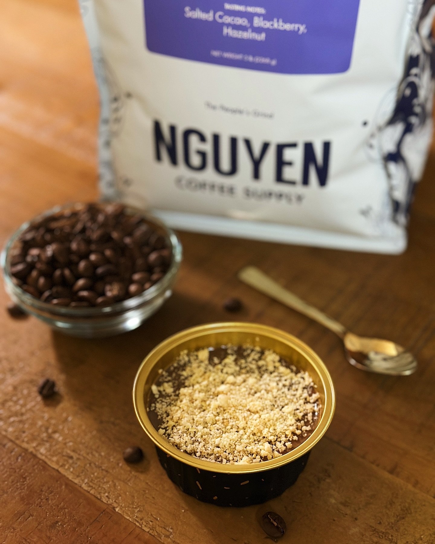 Treat yourself to a little pick-me-up with our Cafe Sữa Đ&aacute; Custard with a banana sugar dust topping. Made with the dark-roasted Saigon coffee beans by @nguyencoffeesupply for that powerful, bold flavor ☕️