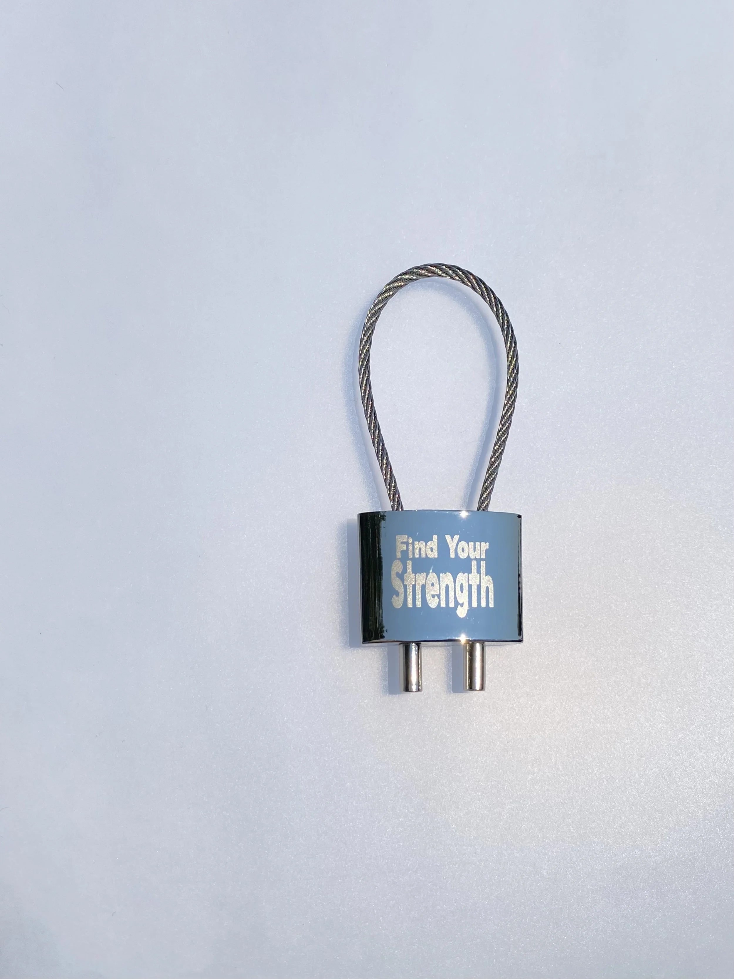 Silver metal steel padlock lock style twist wire cable keychain with the motivational quote "Find Your Strength"