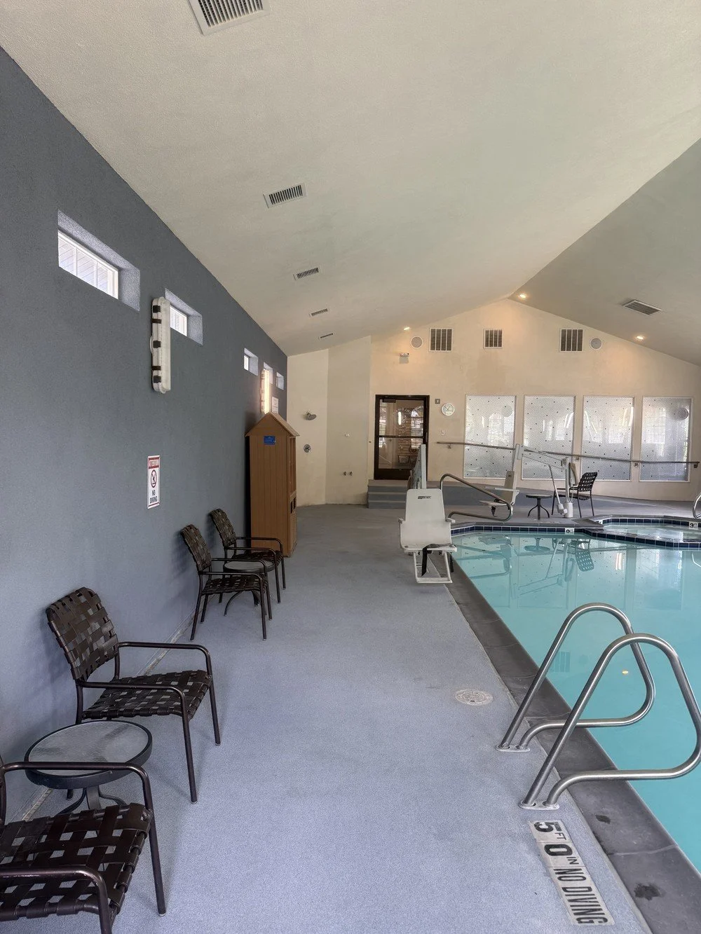 Commercial hotel pool deck floor coating and pool area repainting completed by Element Coatings in Utah.
