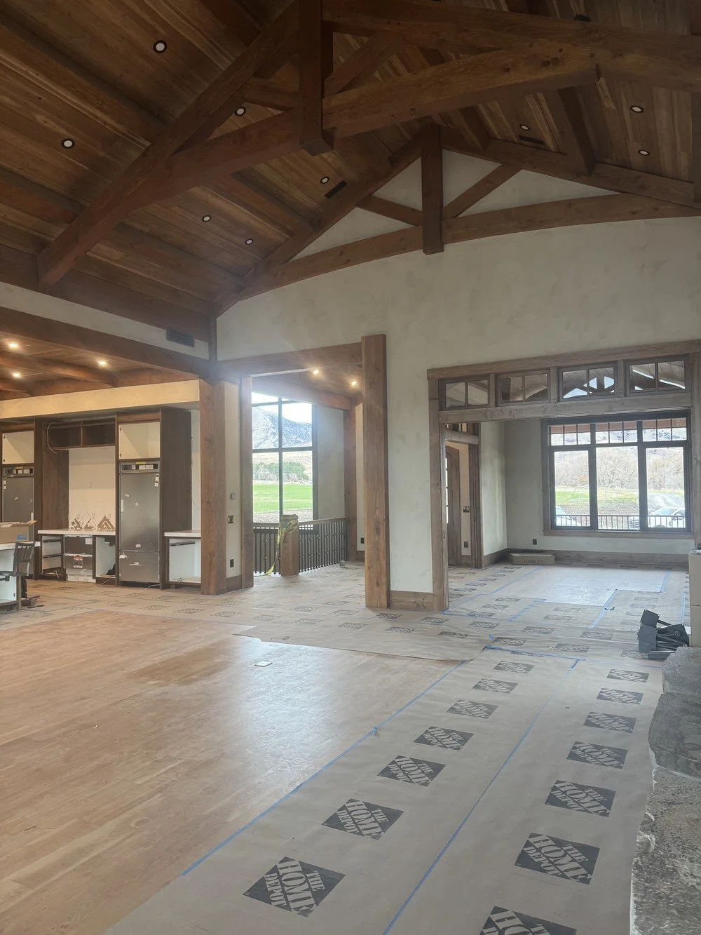 Interior limewash walls with custom stain-grade wood finishing completed by Element Coatings in Salt Lake City, Utah.