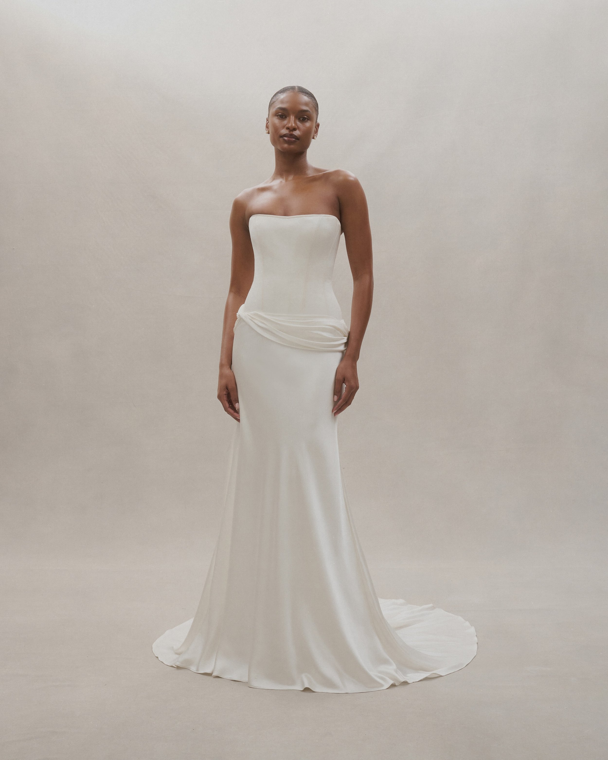 Noa by @alexandragrecco 

A gown that feels refined at its core, with the option to shift the look through considered additions. An overskirt for added presence, or a soft neckline drape to introduce movement and depth.

Each element is designed to c