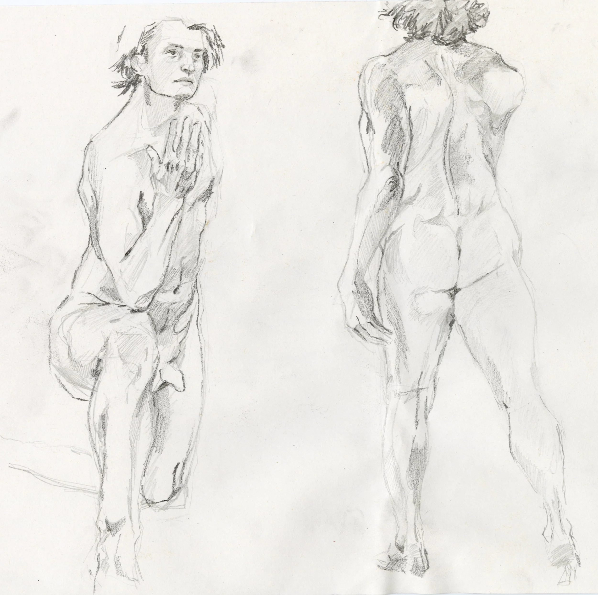 Sketch of two nude female models, one kneeling with hands clasped near her face and the other standing with her back turned, showing detailed muscle and bone structure.