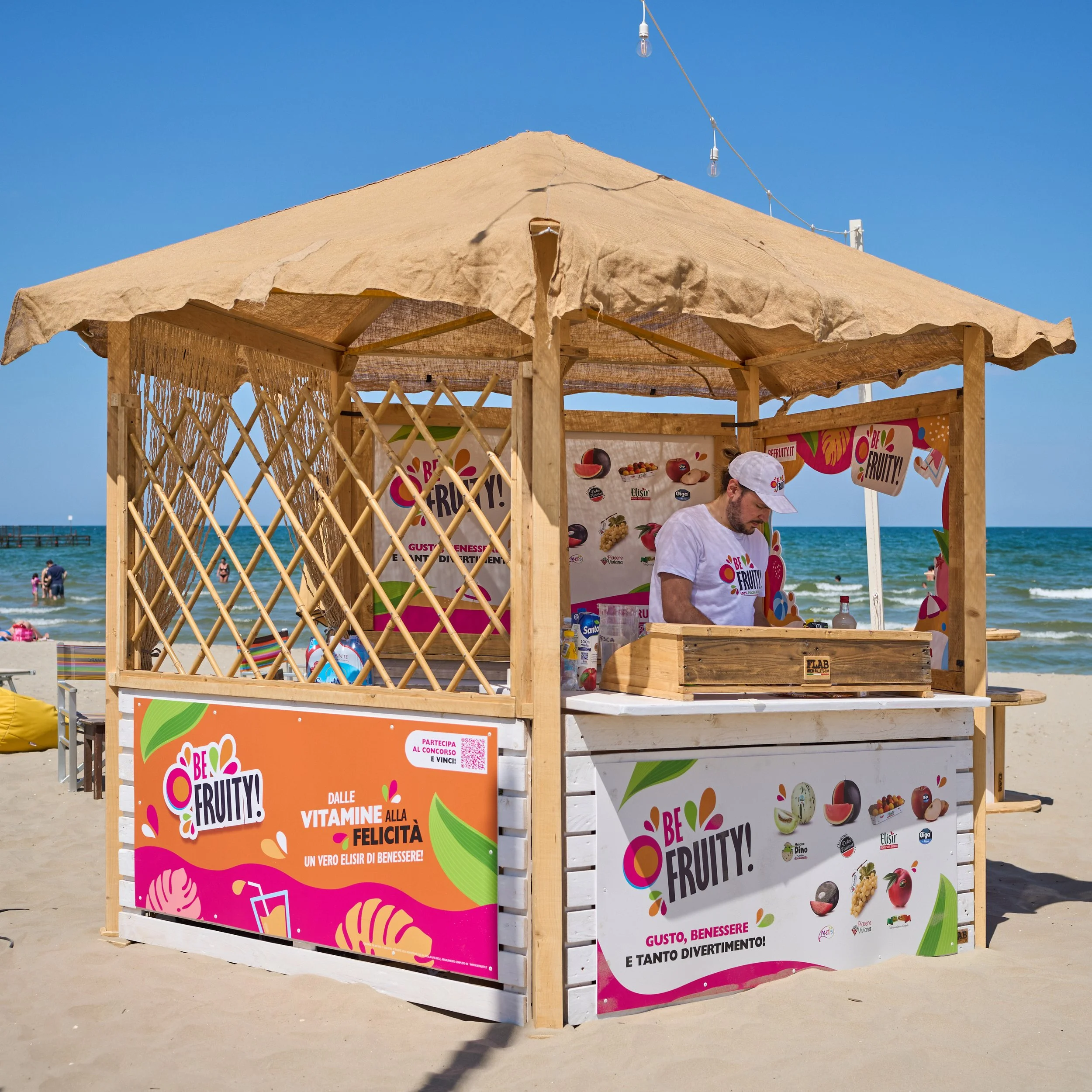 Be Fruity 2024 beach stand with fresh fruit on the Rimini shore