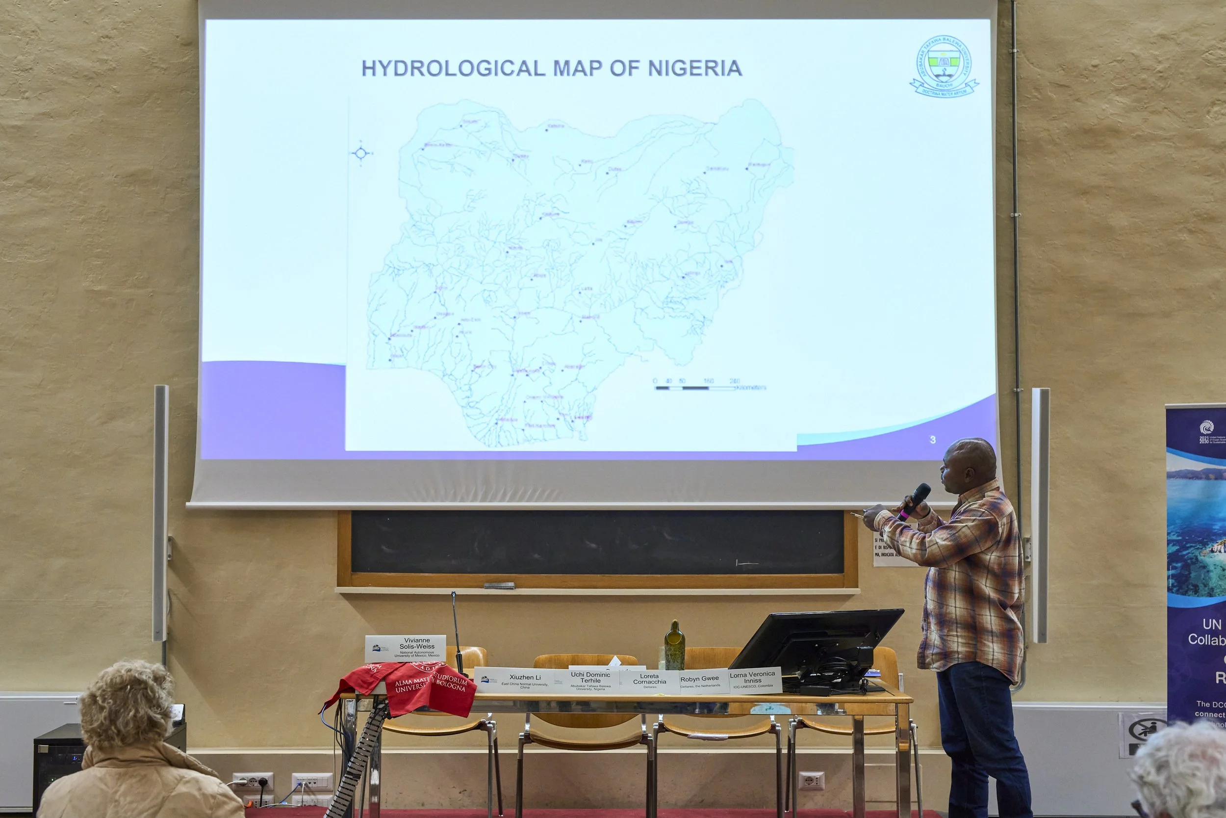 Speaker presenting at the University of Bologna workshop on sustainable coastal management