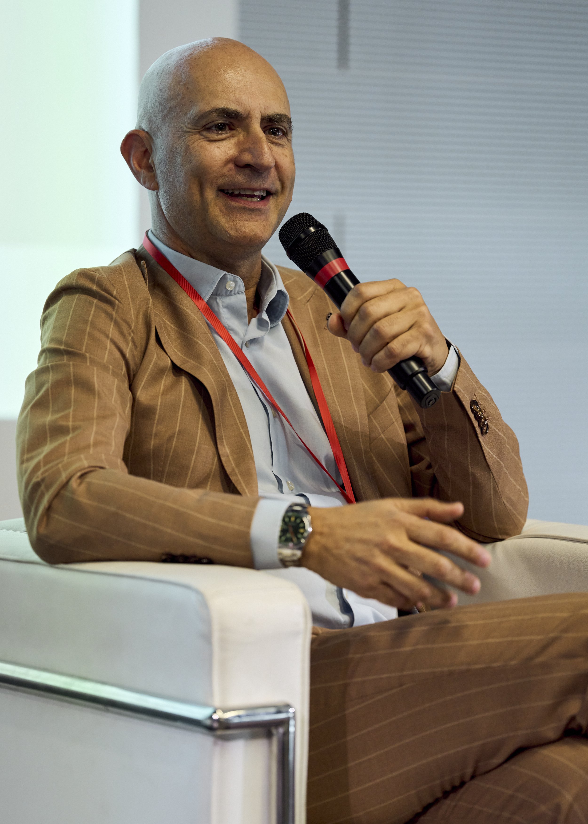 Speaker on stage at Cyberama 2025 cybersecurity conference in Imola