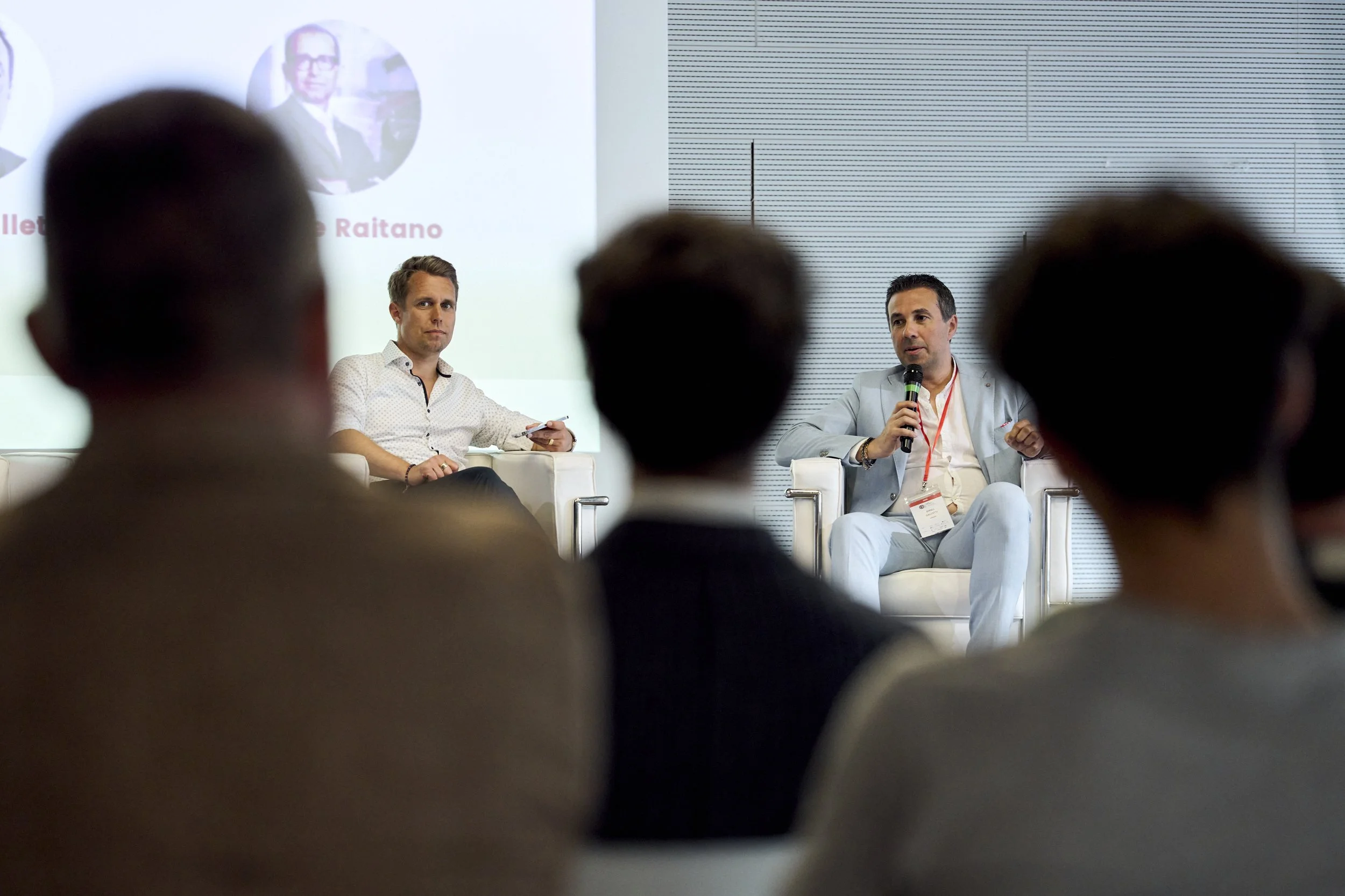Speaker on stage at Cyberama 2025 cybersecurity conference in Imola