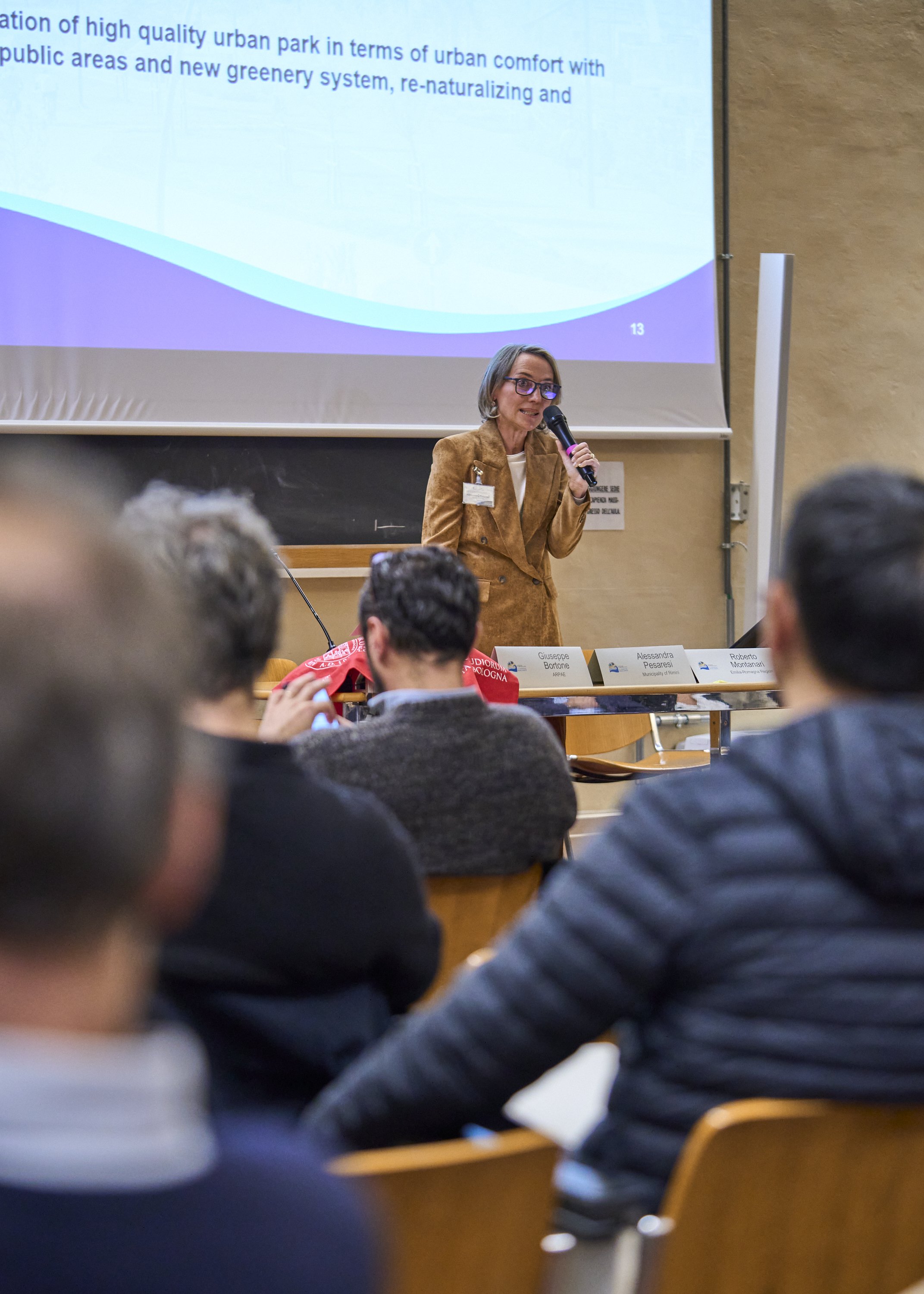 Speaker presenting at the University of Bologna workshop on sustainable coastal management