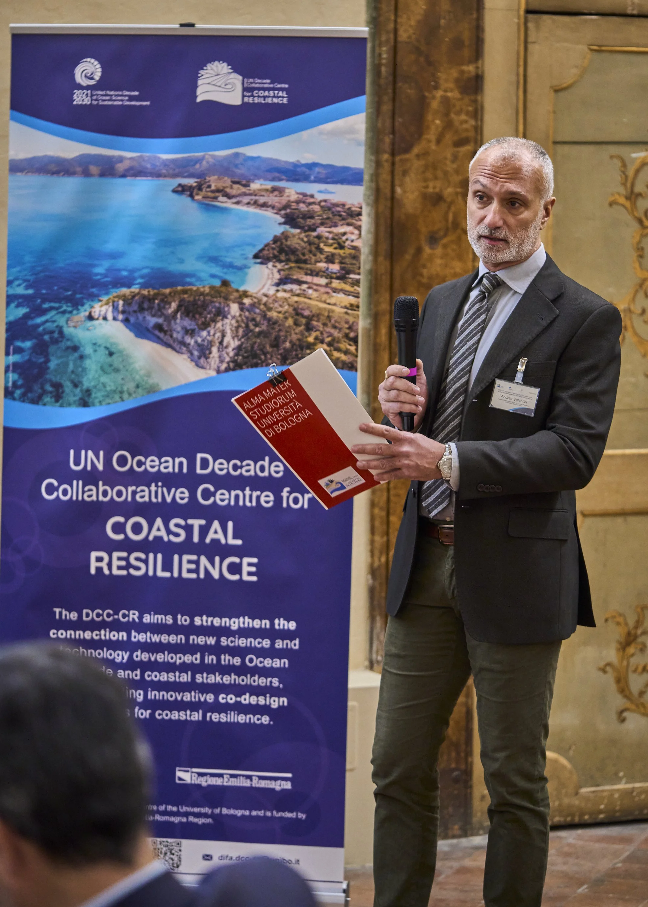 Speaker presenting at the University of Bologna workshop on sustainable coastal management