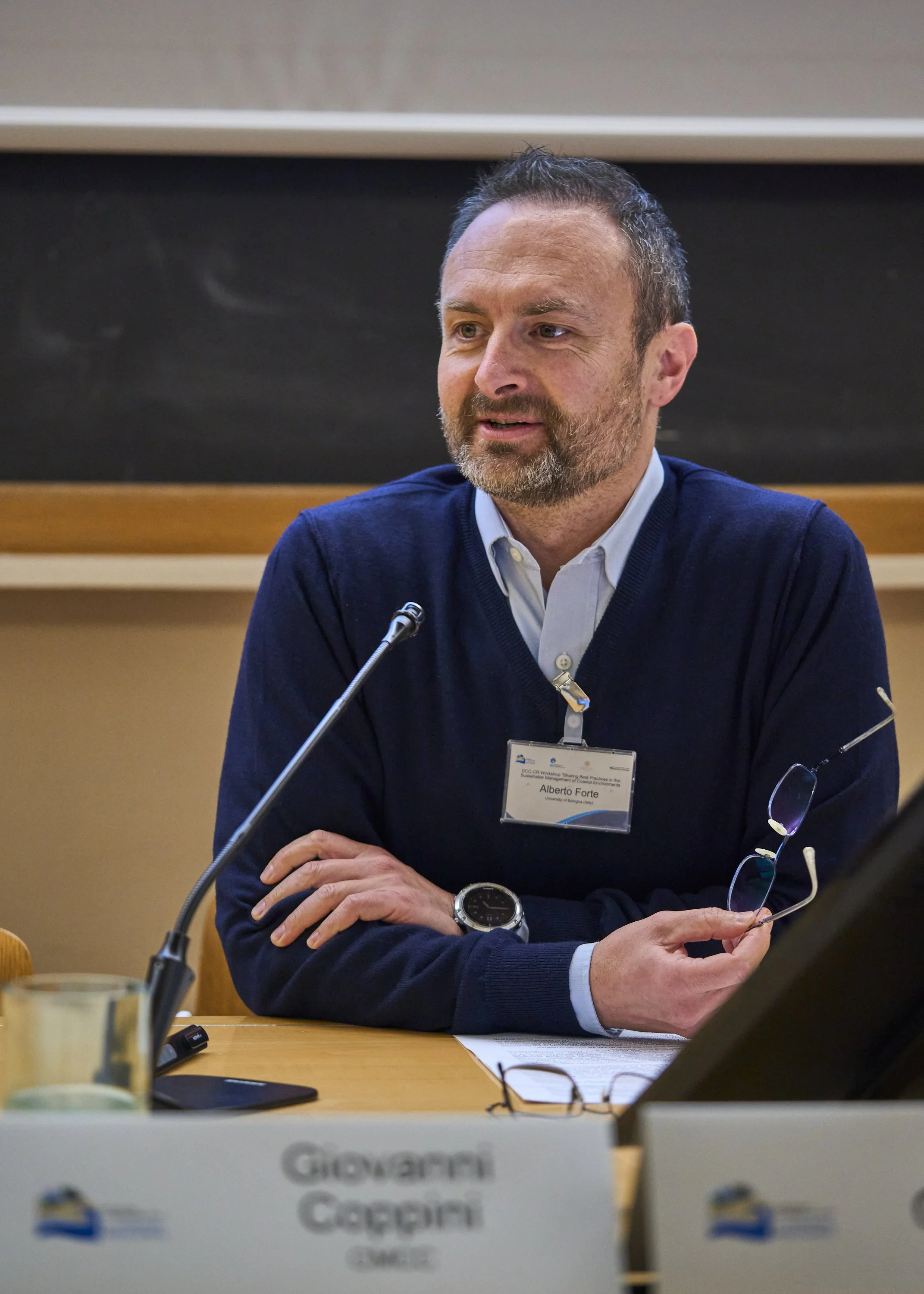 Speaker presenting at the University of Bologna workshop on sustainable coastal management