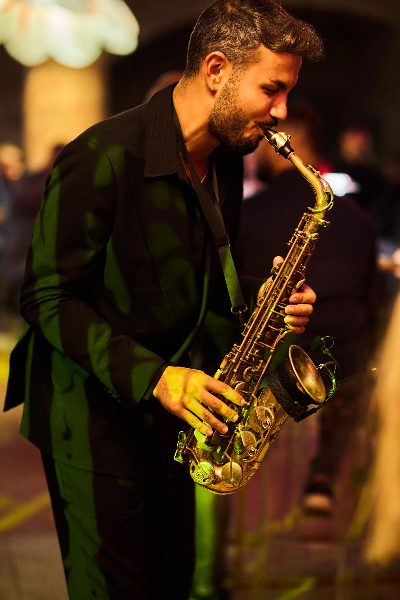 Live music performance during the Qua Granite party at Palazzo Re Enzo