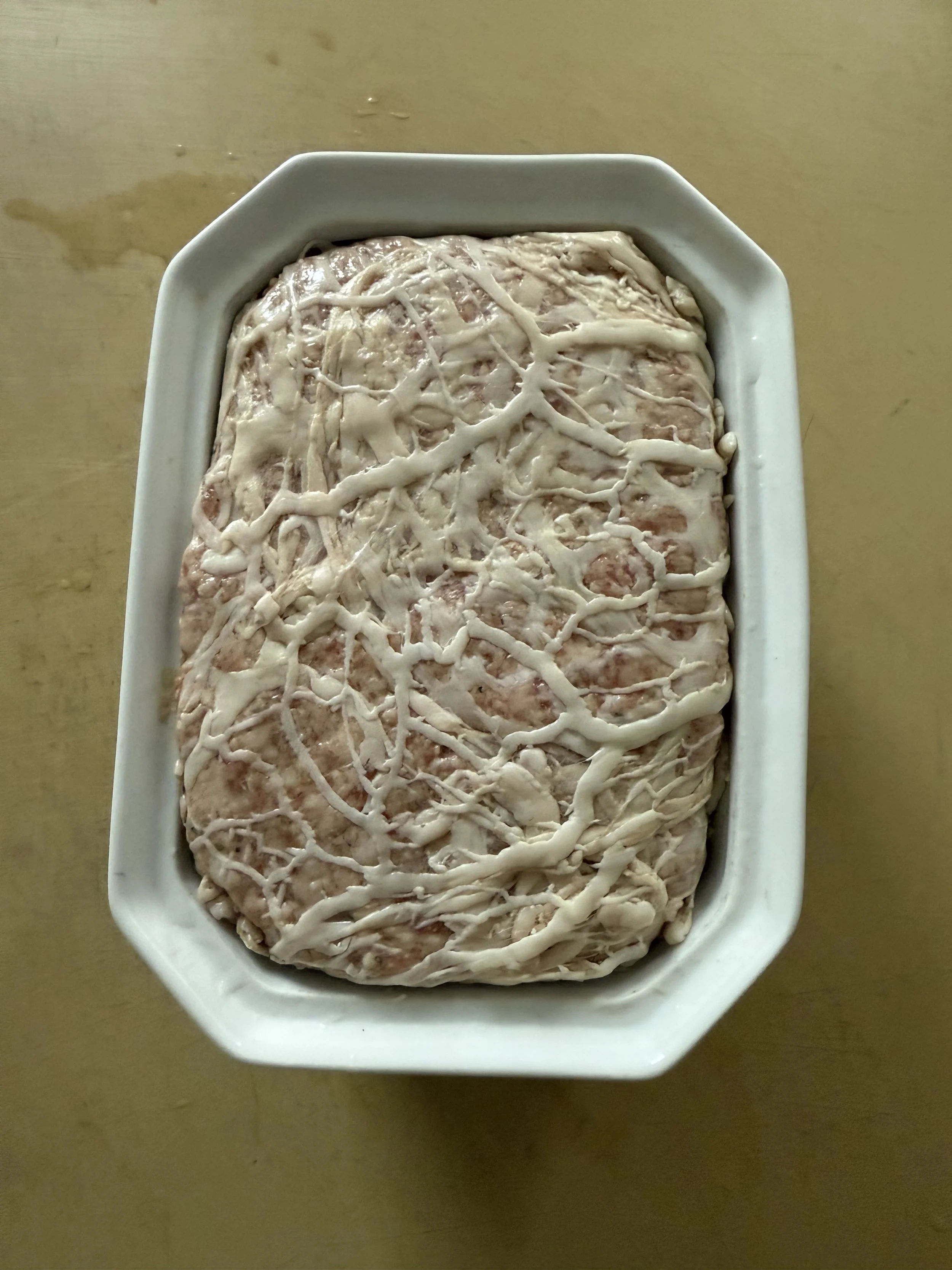 The pate wrapped in caul fat