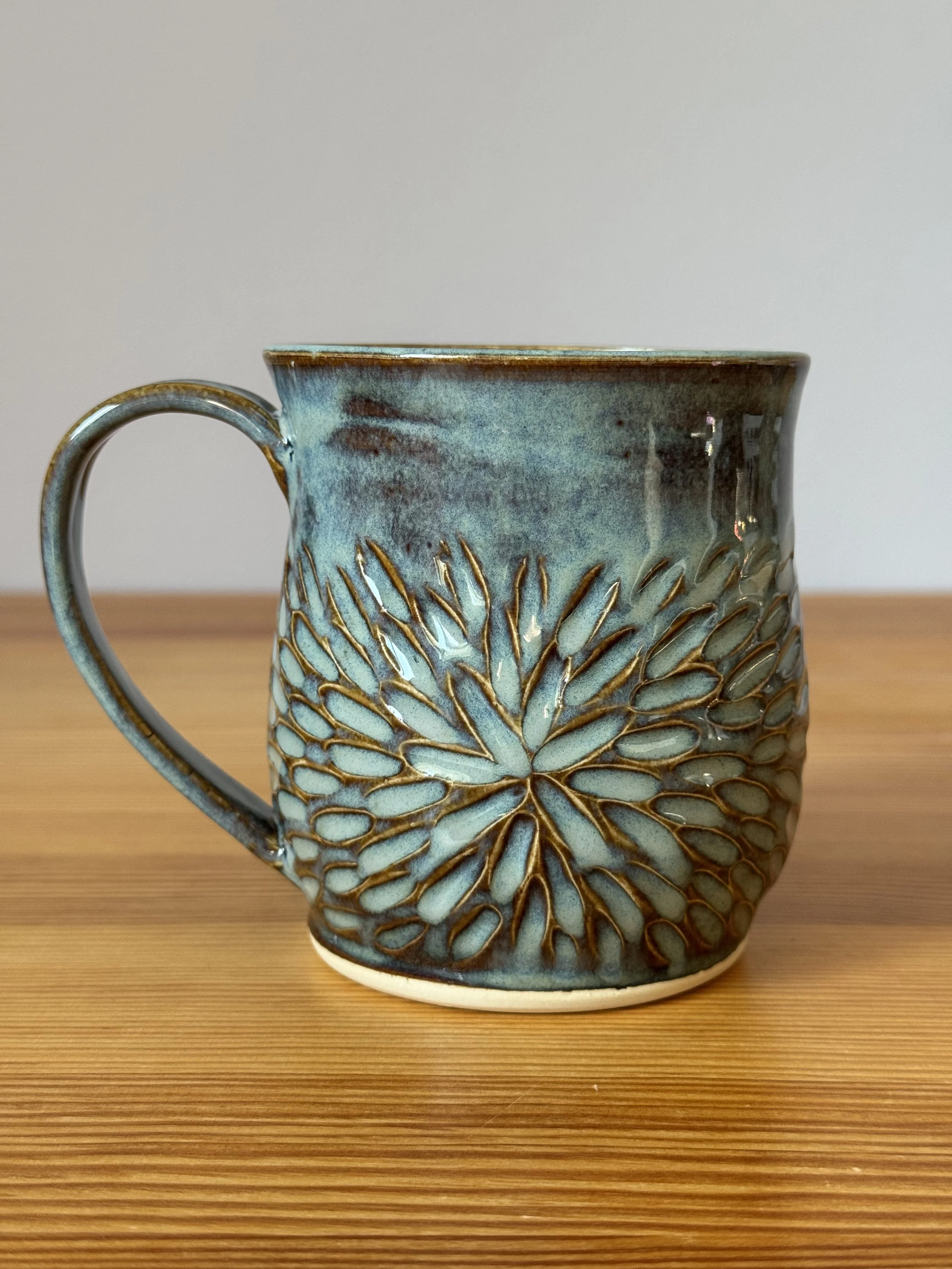 Starburst Mug - Stormy Skies - handcarved.jpeg