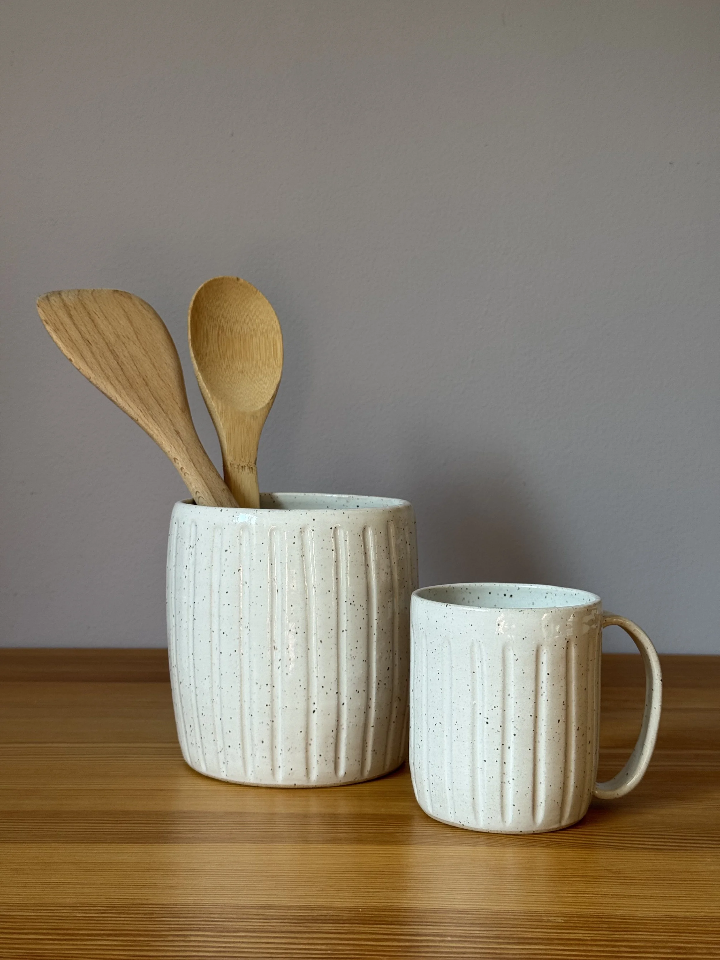 Speckled White Fluted Mug with Utensil Canister.jpeg