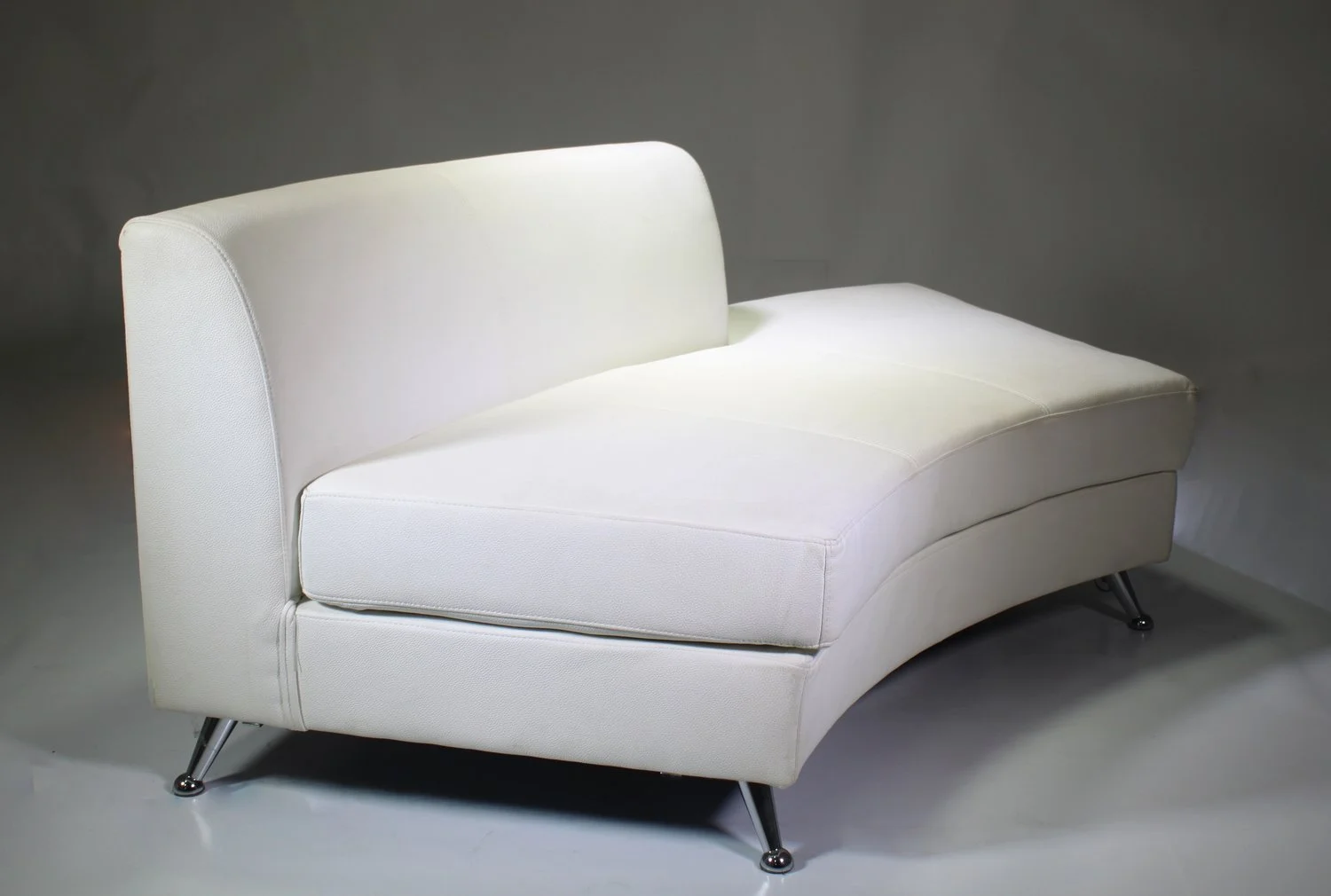 white-curved-chaise-lounge-for-events.jpg