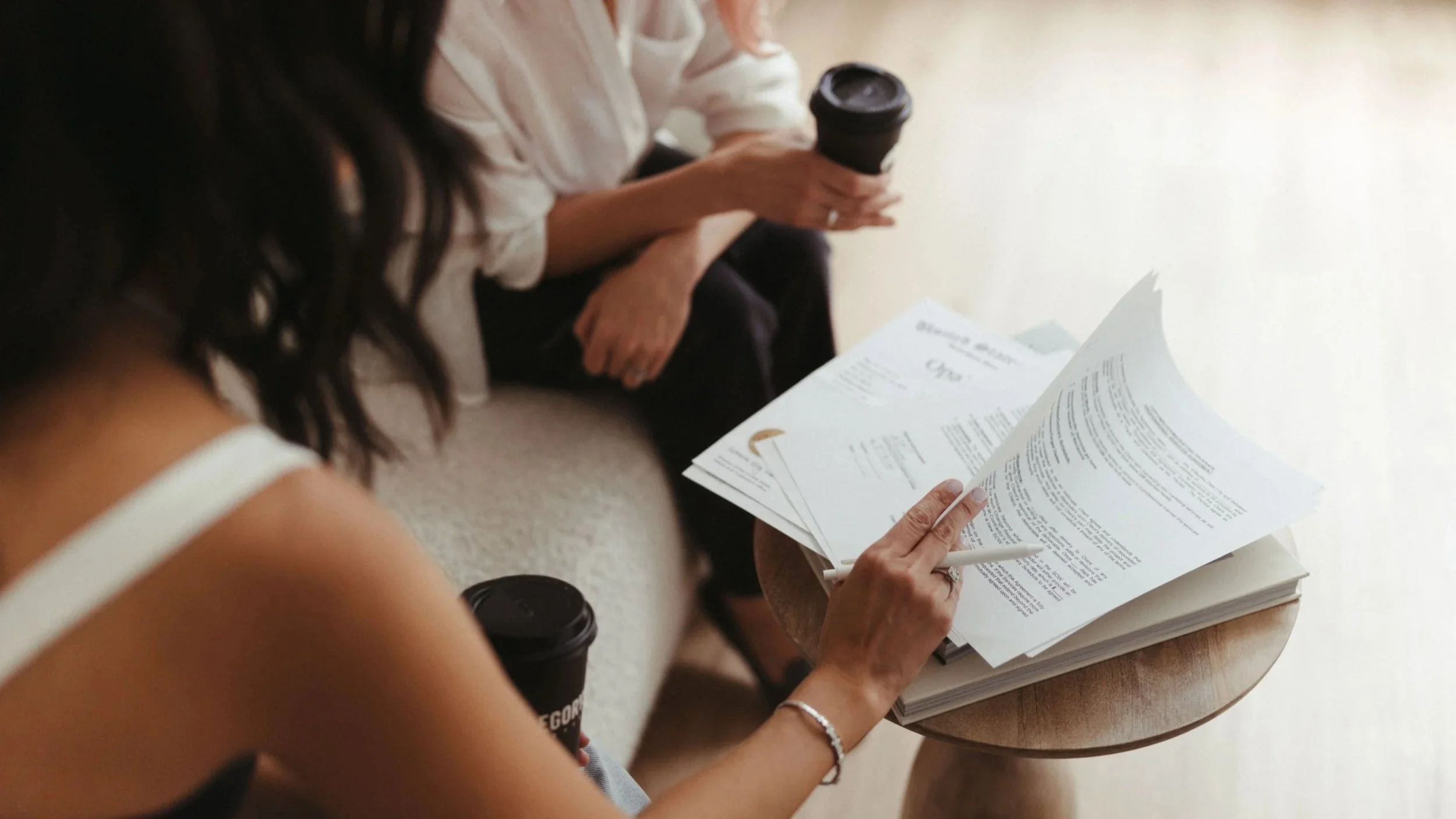 Mika Mooney works with a female founder client to help her avoid common trademark violations unintentionally committed by business owners