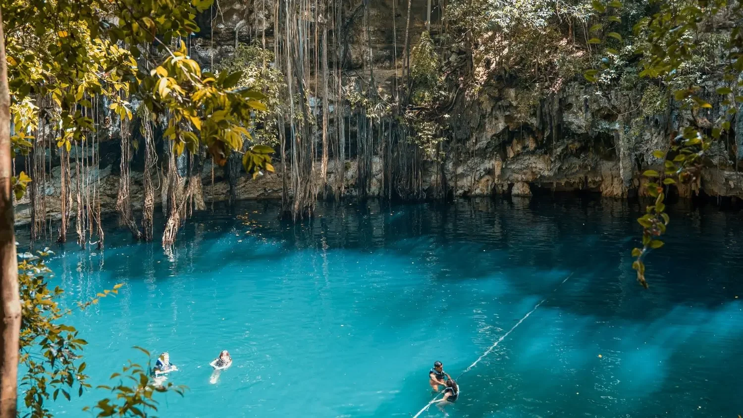 The into a cenote with access for swimming in the Yucatán