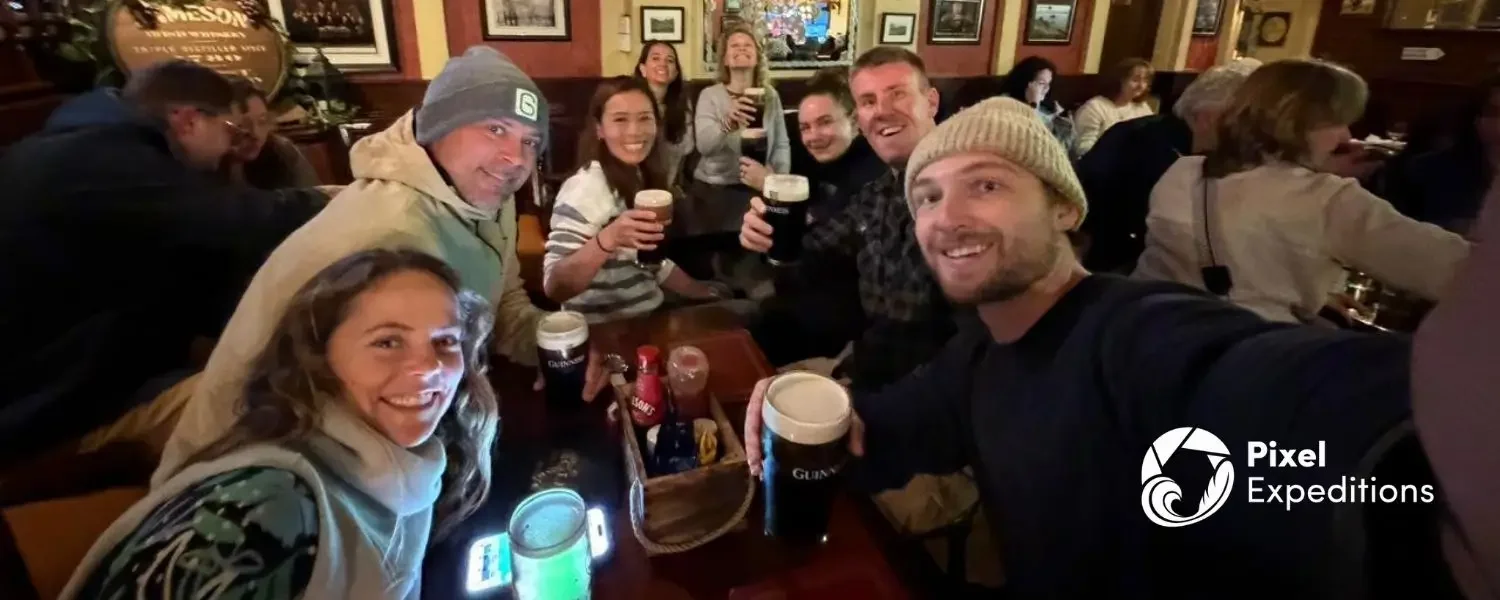 Pixel Expeditions guests celebrating with Guinness in Ireland