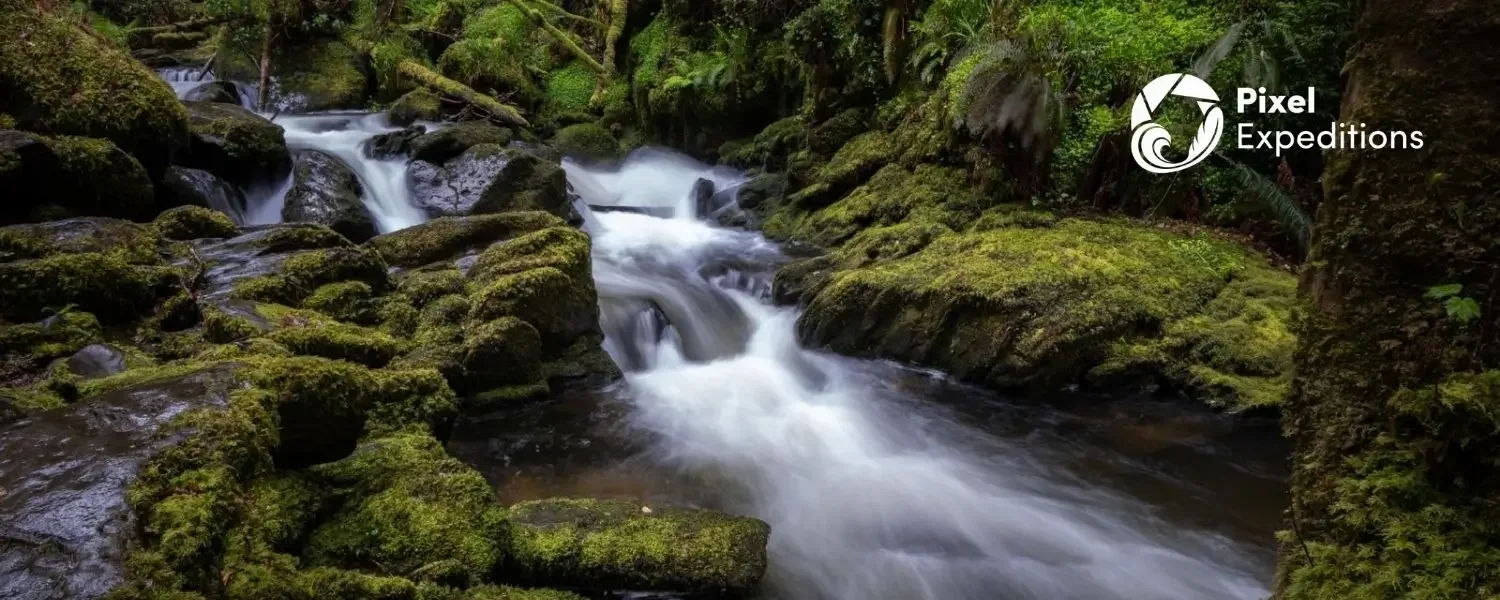A long exposure photo of a river in full flow in the West of Ireland