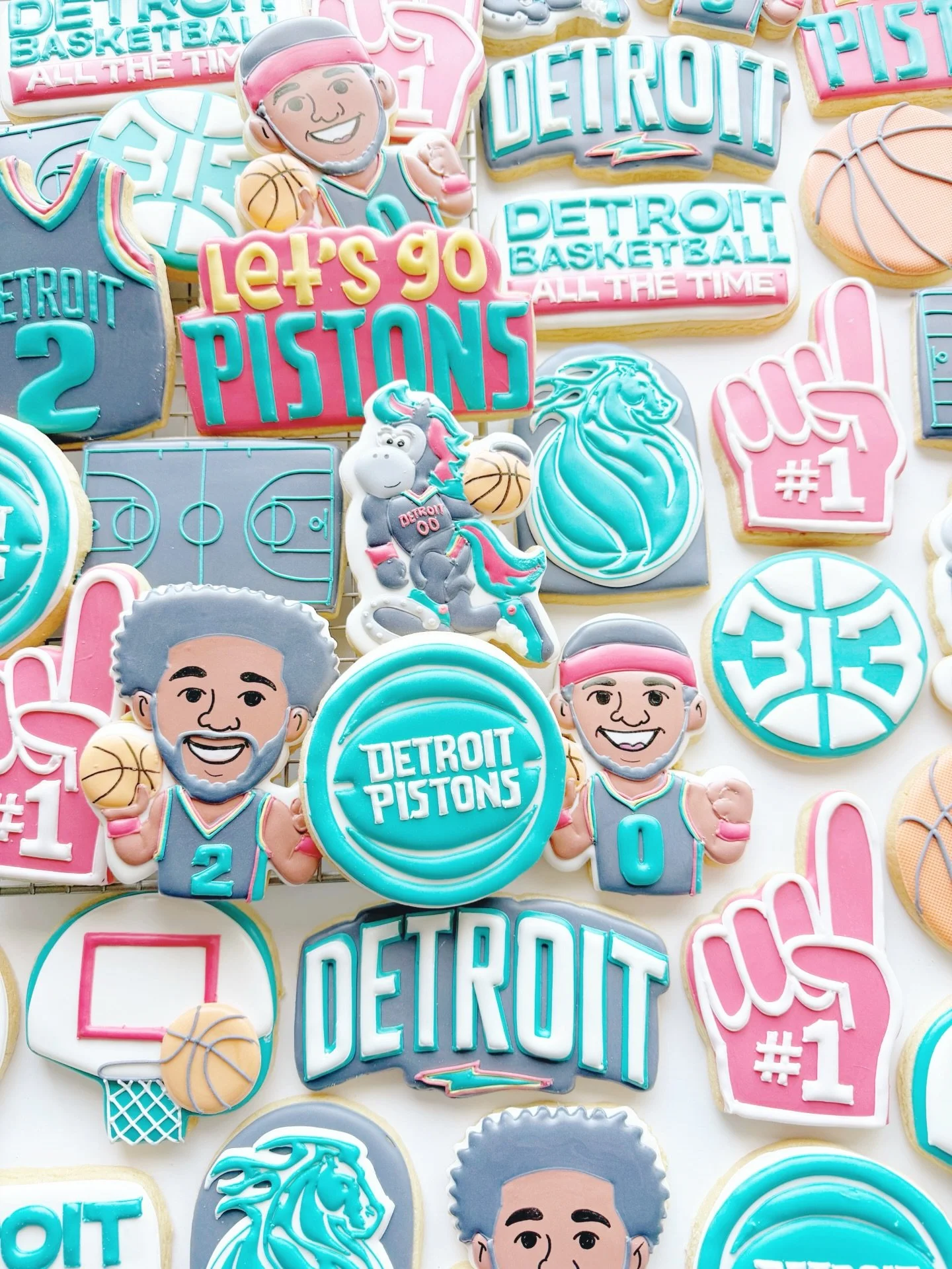Round 1. Game 1. These pistons cookies are wearing their city edition themed jerseys and ready to get BACK TO WORK!!! Let&rsquo;s go @detroitpistons !! 

#detroitpistons #detroitpistonscookies #basketballcookies #deeetroitbasketball #backtowork
