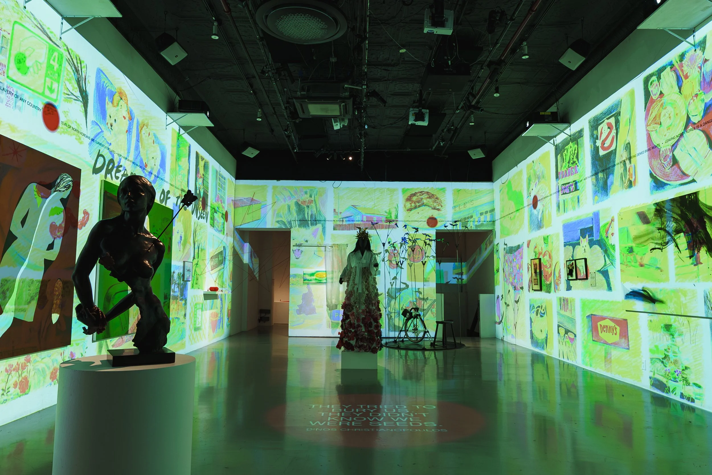 Installation View of UNSEEN with Yong Eun (May) Kwon's illustration projection