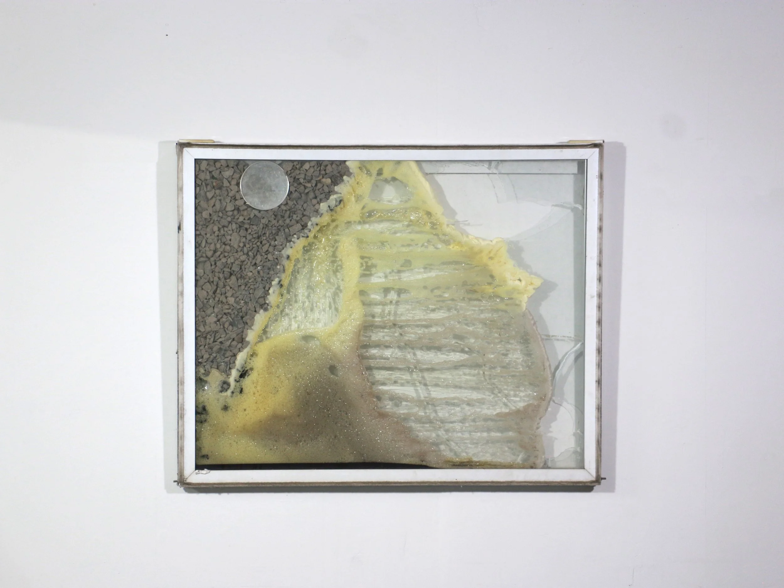 "Normcore Spore"
found window, insulation foam, rocks, concave mirror, caulking
42 x 6 x 34in
(2019)
Private Collection
