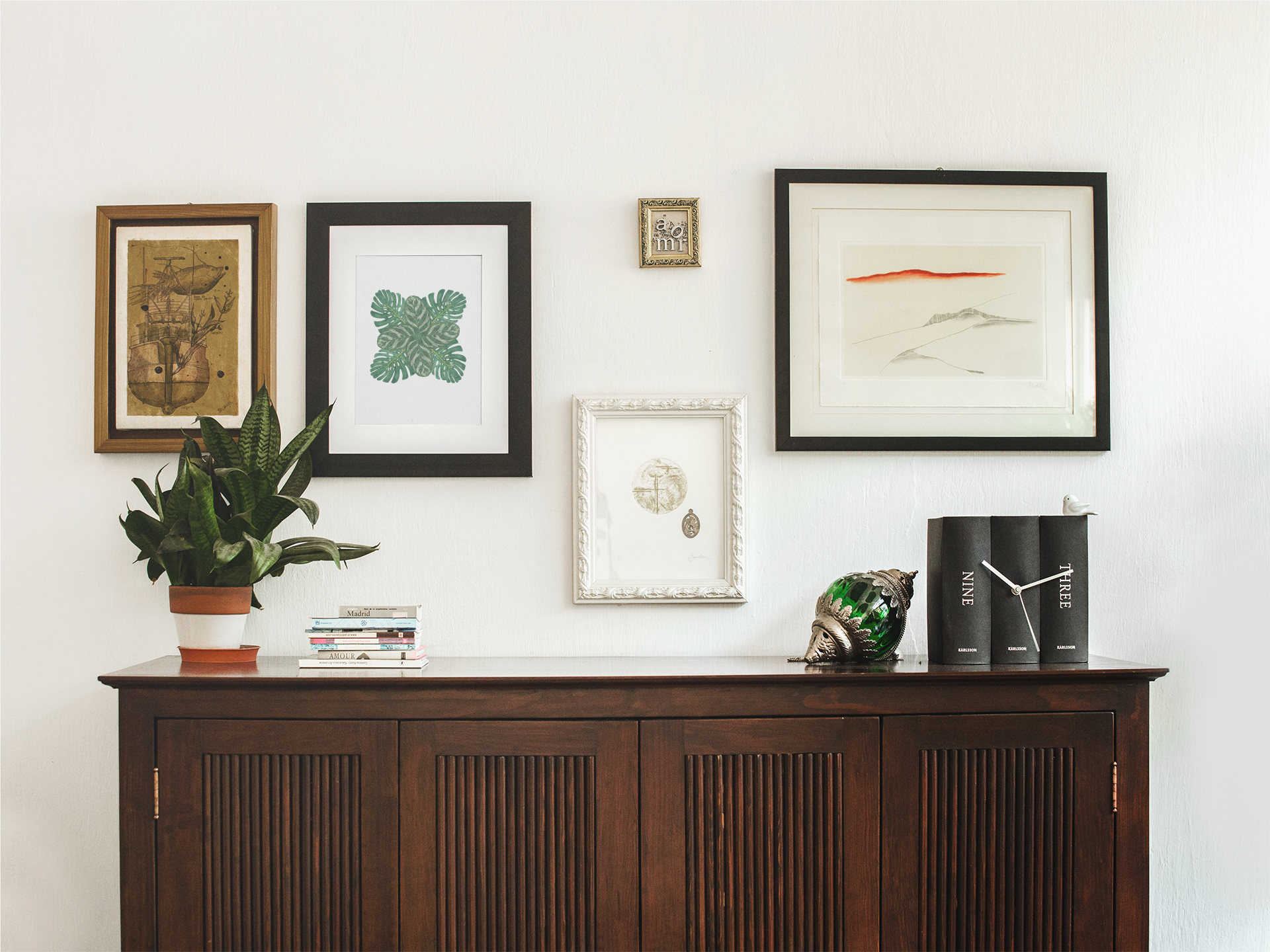 framed-art-print-template-on-a-white-wall-with-other-frames-a14772 (4).png
