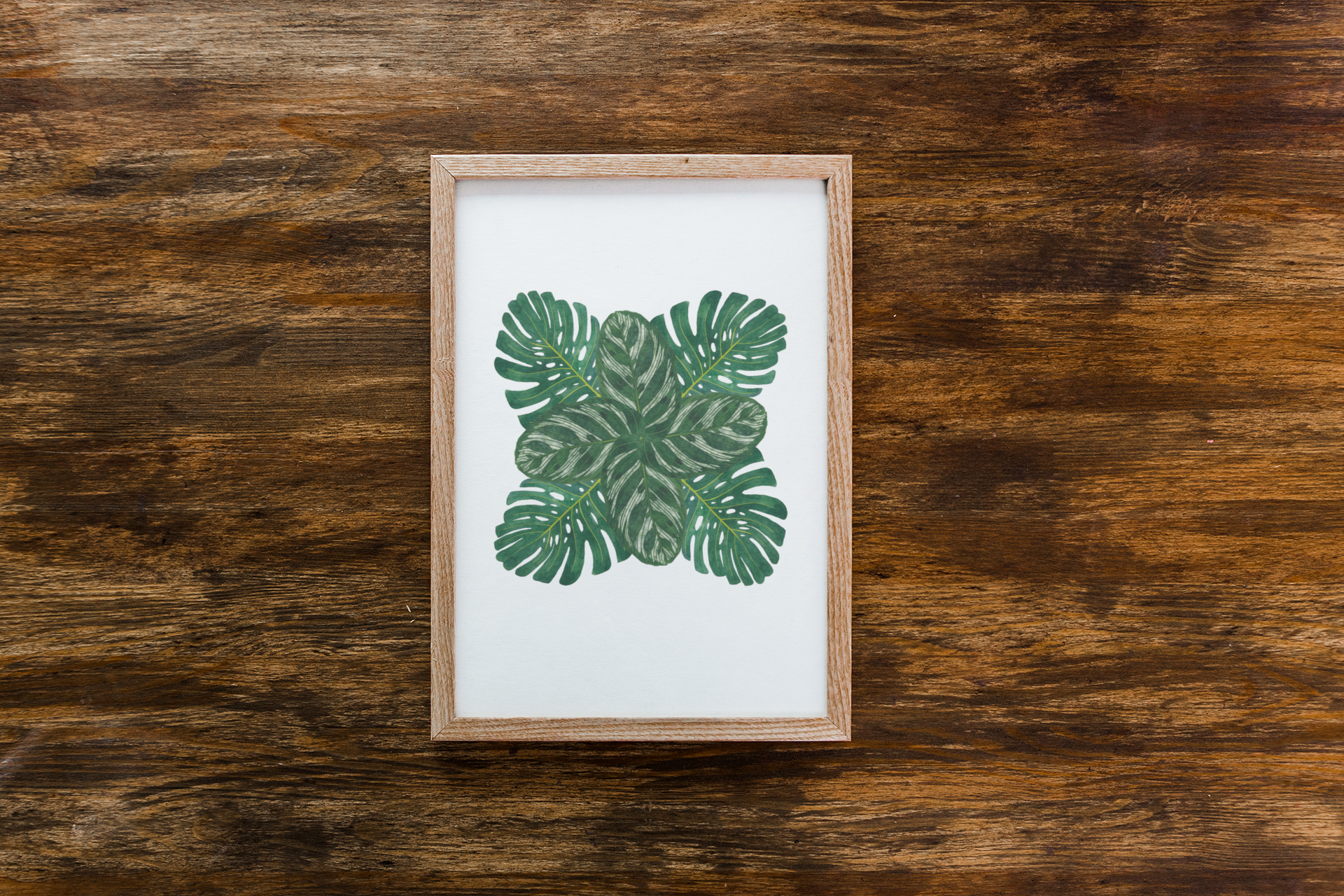 mockup-of-a-framed-art-print-placed-on-a-wooden-surface-36126-r-el2 (3).png