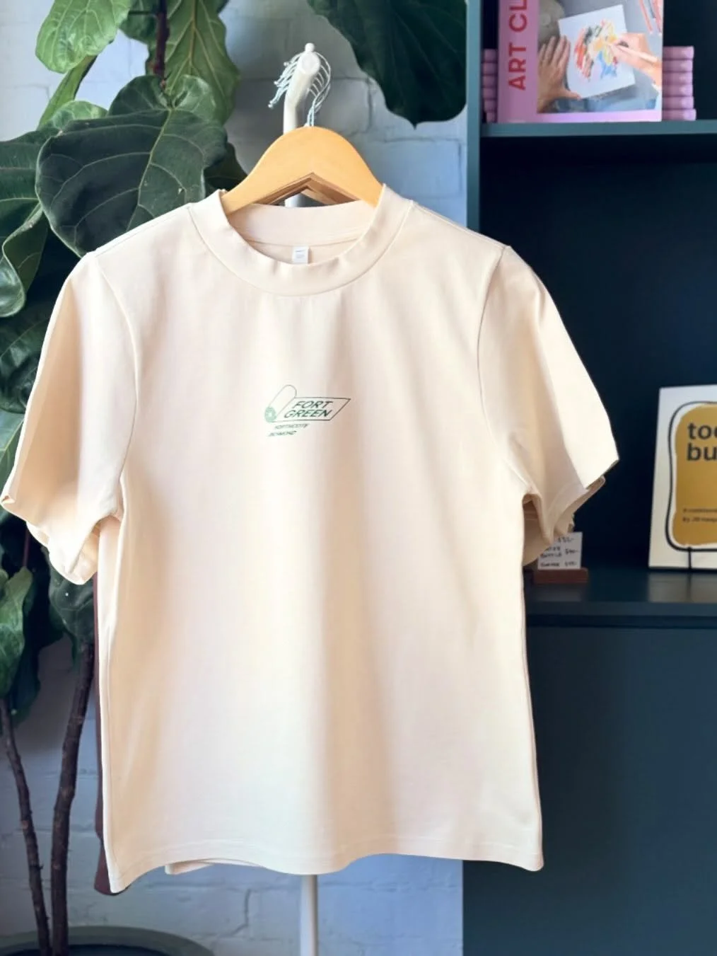 Cute new merch drop. Summer tees now available at both studios 🤍