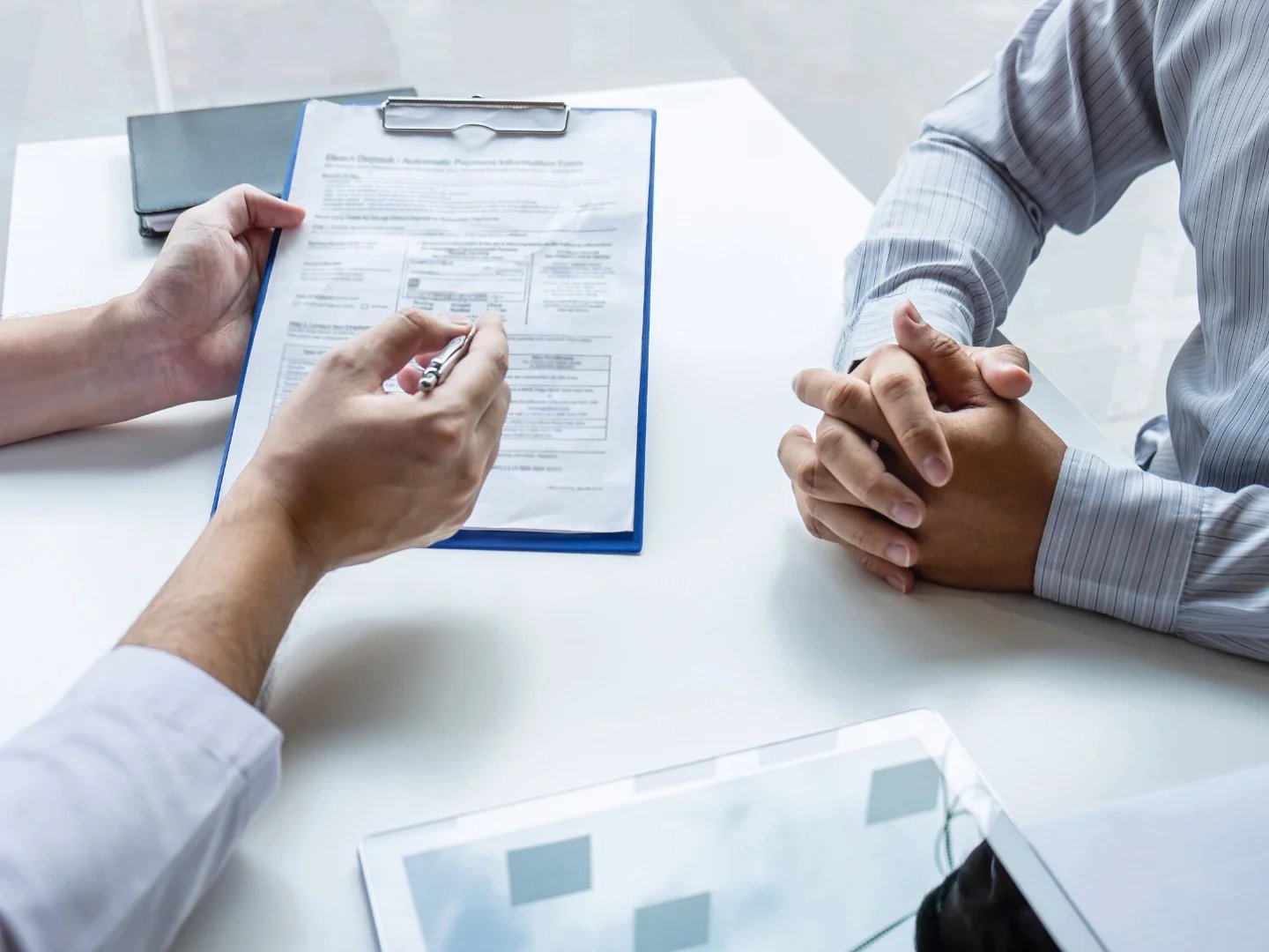Patient having a consultation with a doctor about his treatment plan