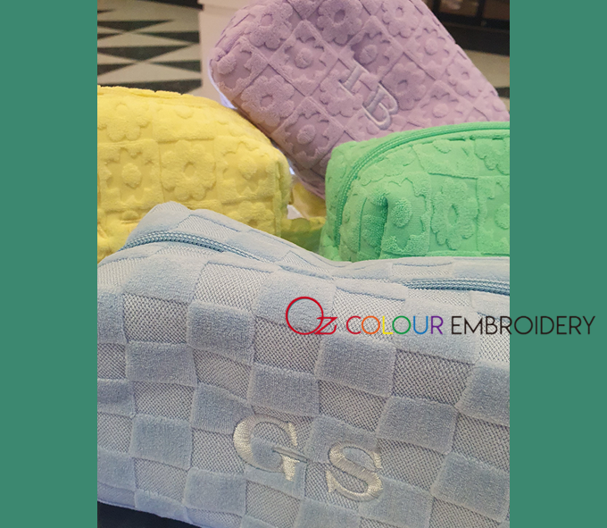 Personalised cosmetic make-up bags. Name embroidered pouches.