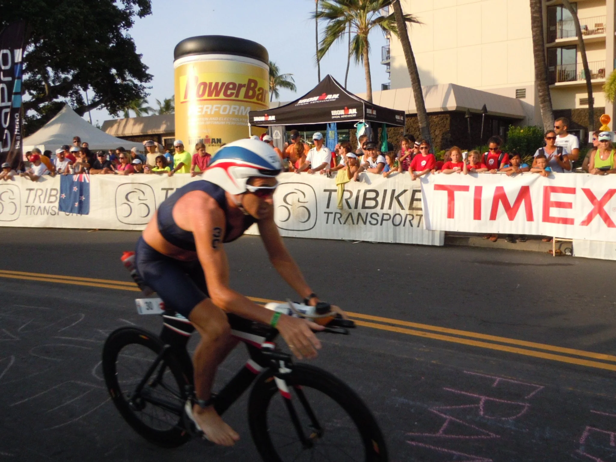 Bicyclist near the finish line at the Ironman competition held annually on the Big Island. The Ironman competition consists of a swim, marathon and bicycle ride totaling 140 miles.