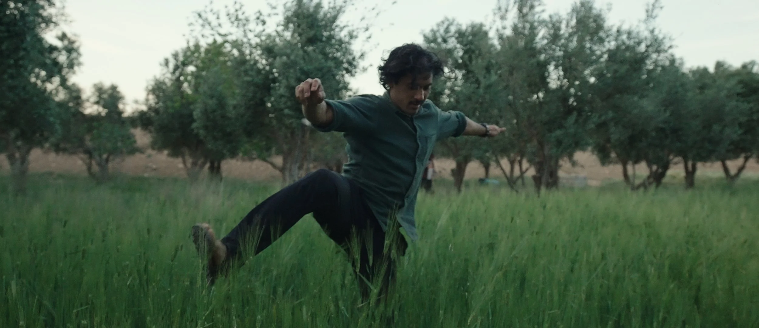 suhayb through high grass.jpg