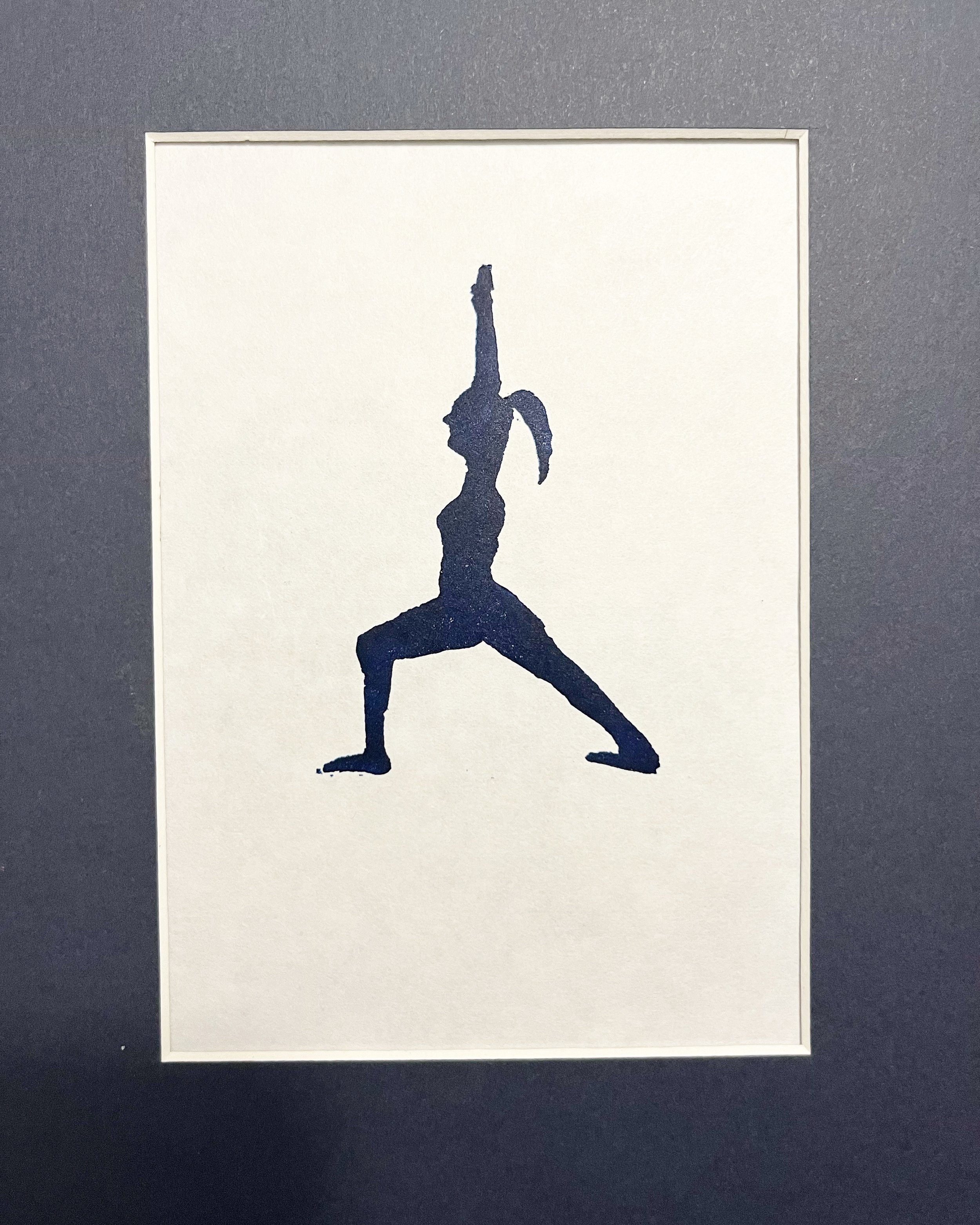 silhouette of a yoga warrior pose