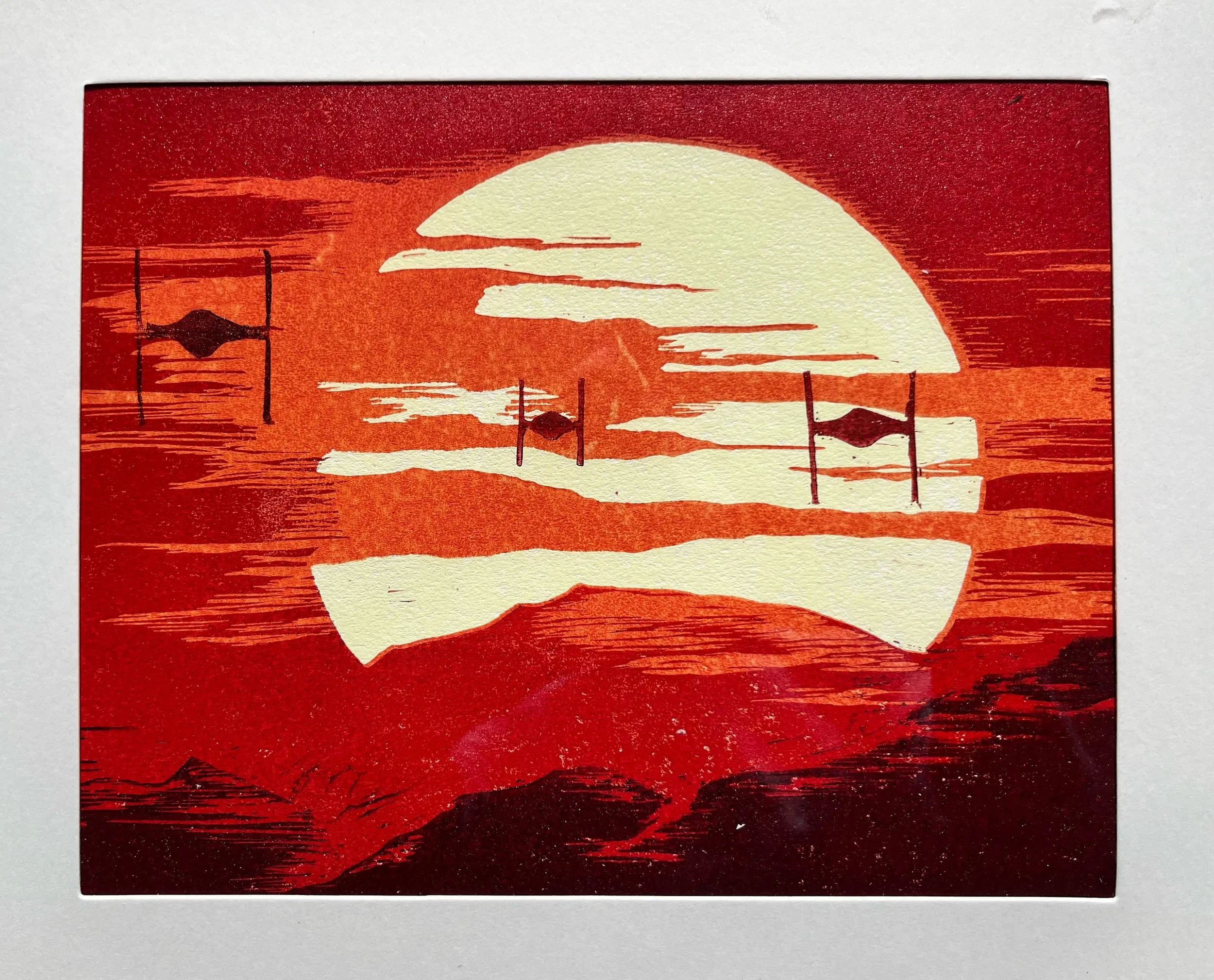 Tie fighters in the sky against an alien sunset