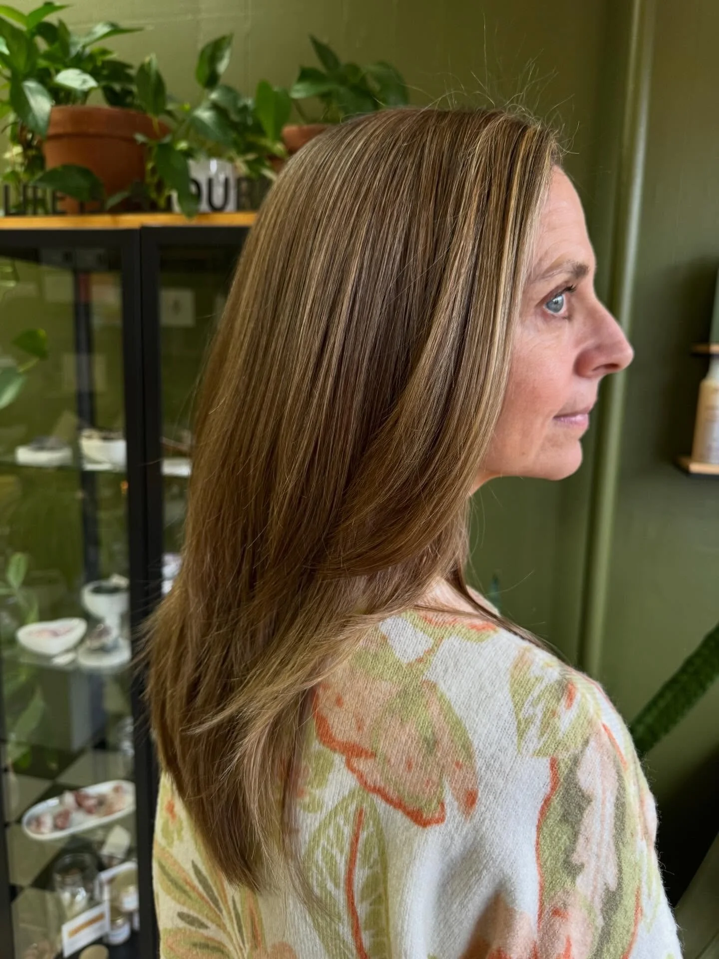 Low maintenance fine hair layered cut with grey blending with dimensional color.