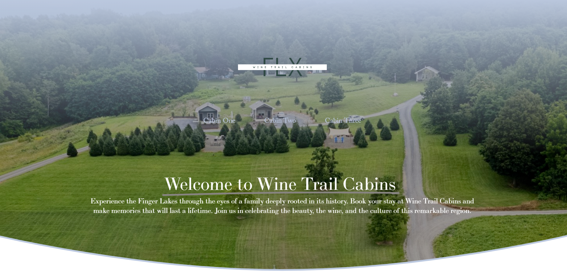 Aerial view of a countryside with three small cabins labeled Cabin One, Cabin Two, and Cabin Three, surrounded by lush green grass and trees, with winding roads and a forested background, part of a brochure for Wine Trail Cabins in the Finger Lakes region.
