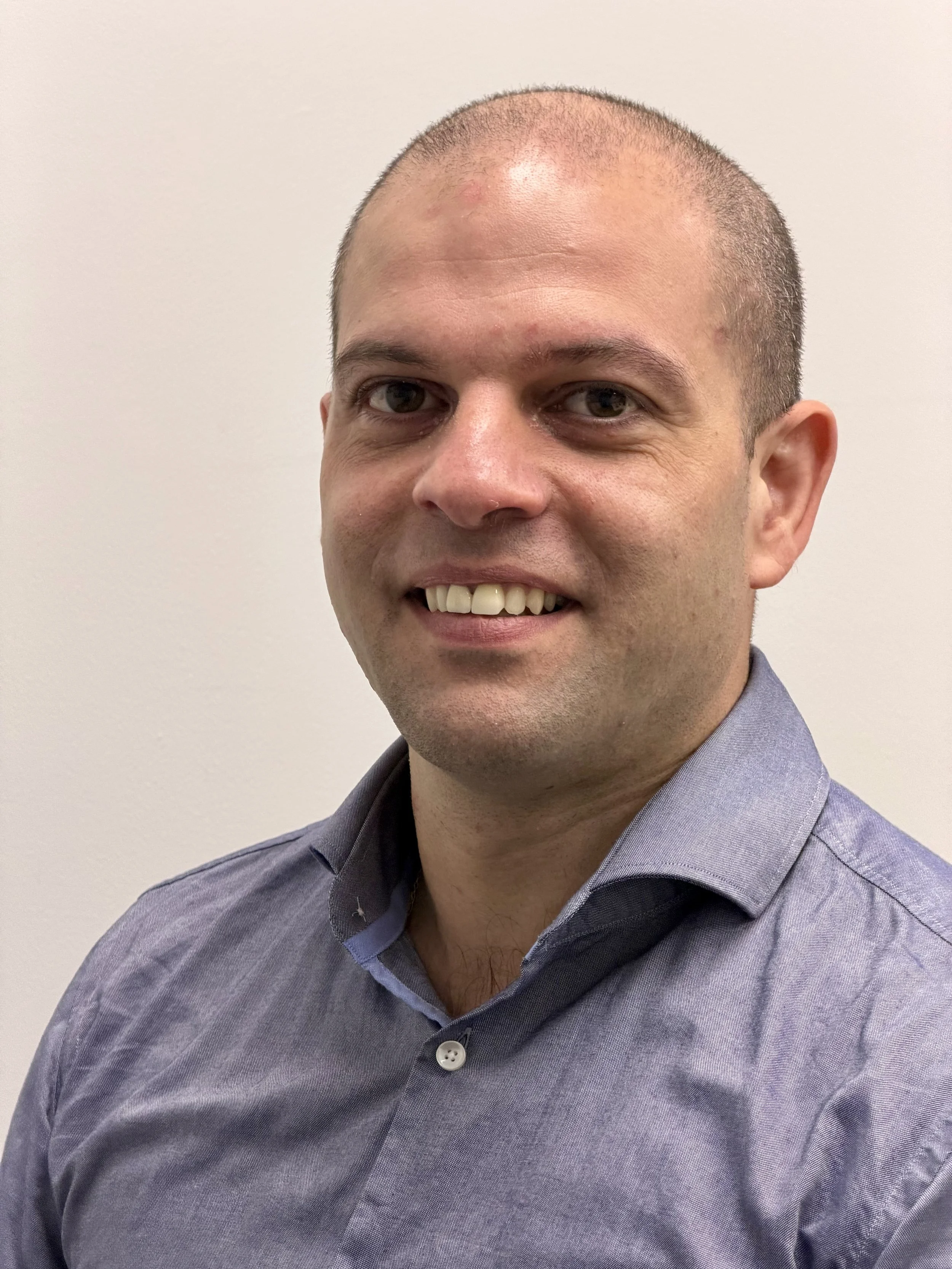 A 3D bar graph showing financial values, with blue bars and a gold border, increasing in height from left to right.