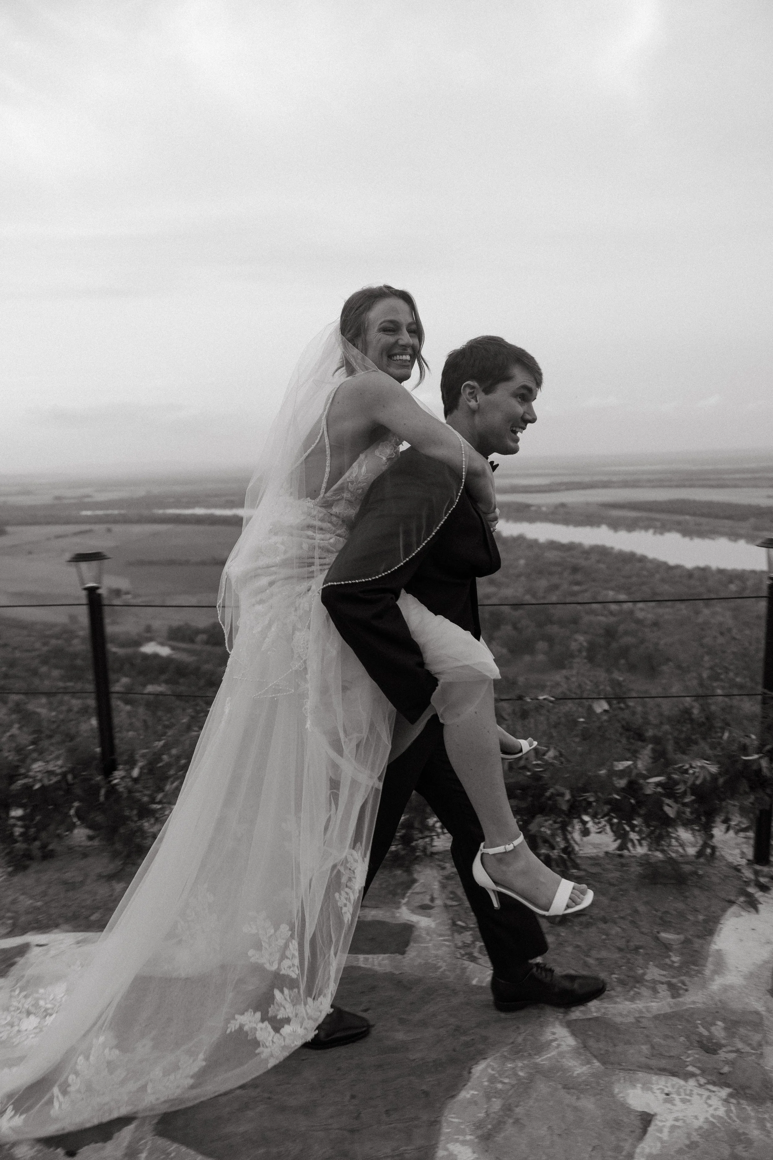Black and White artistic photography of a Bride and Groom on their wedding day on Petit Jean Mountain in Arkansas