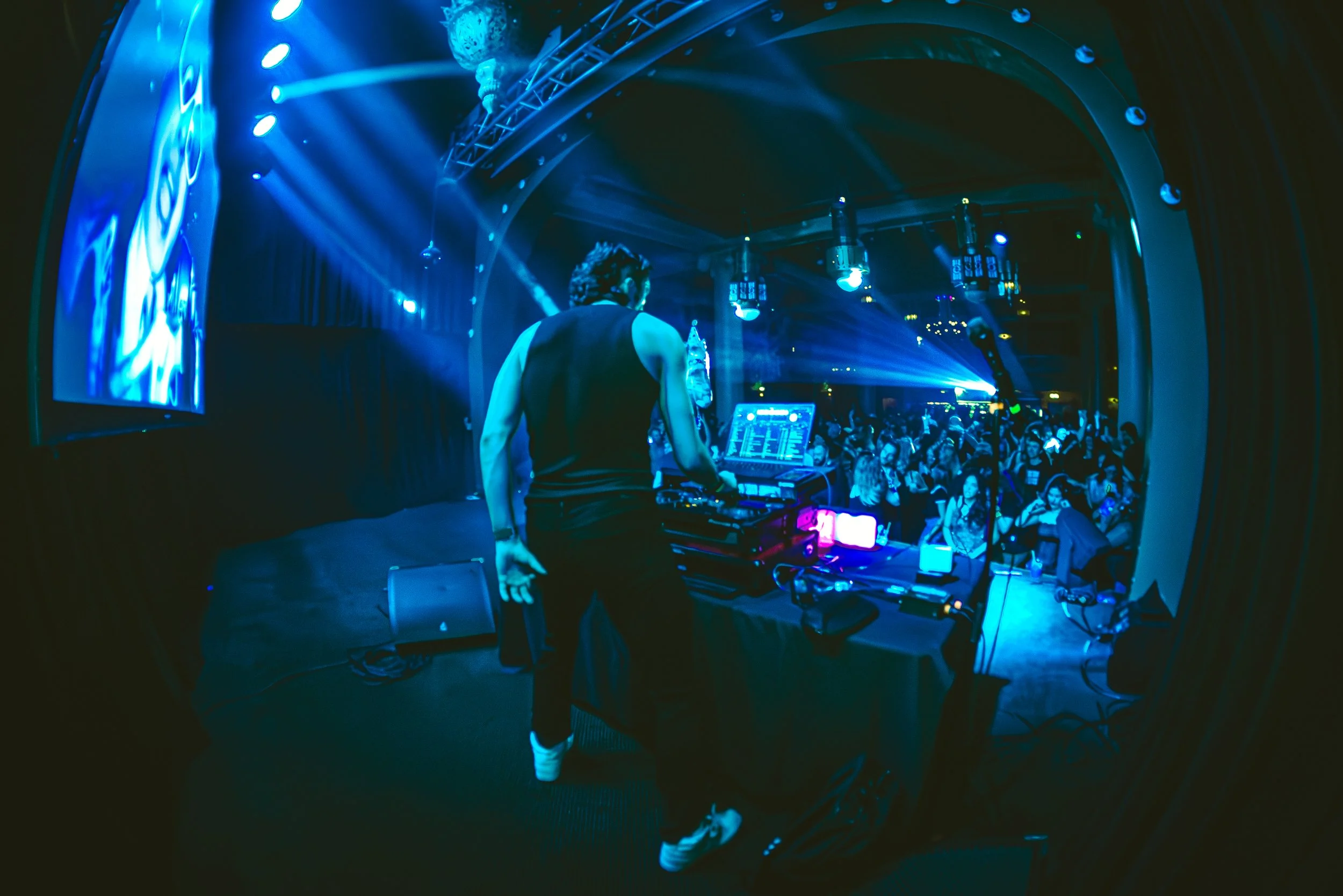 DJ Dance Dance spinning 80s, 90s, Y2K ar a sold out show with lots of dancing