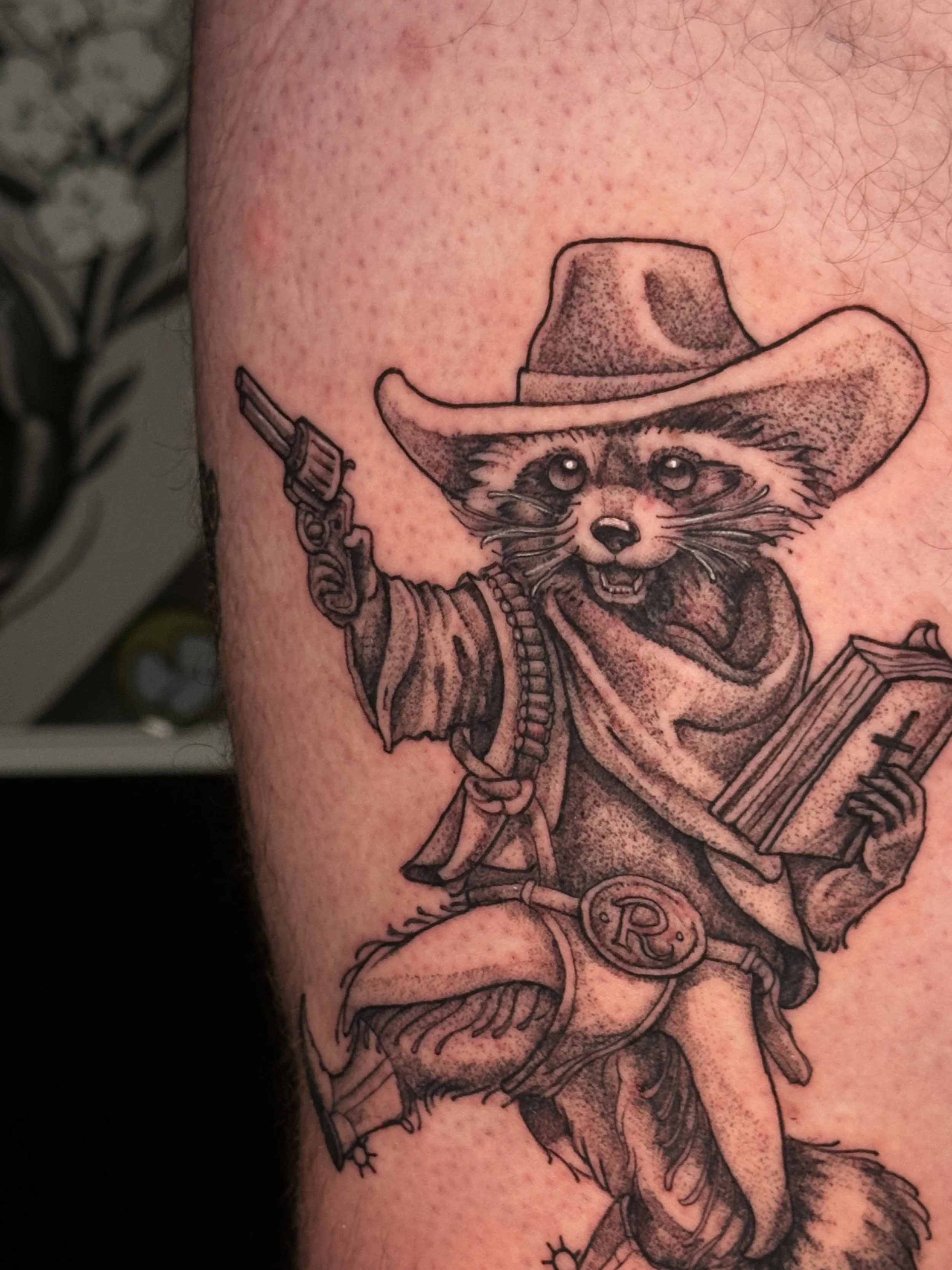 Rocky Raccoon, the Beatles, inspired tattoo, raccoon with revolver, belt buckle, cowboy hat cute raccoon tattoo, critter, drawing of raccoon tattoo