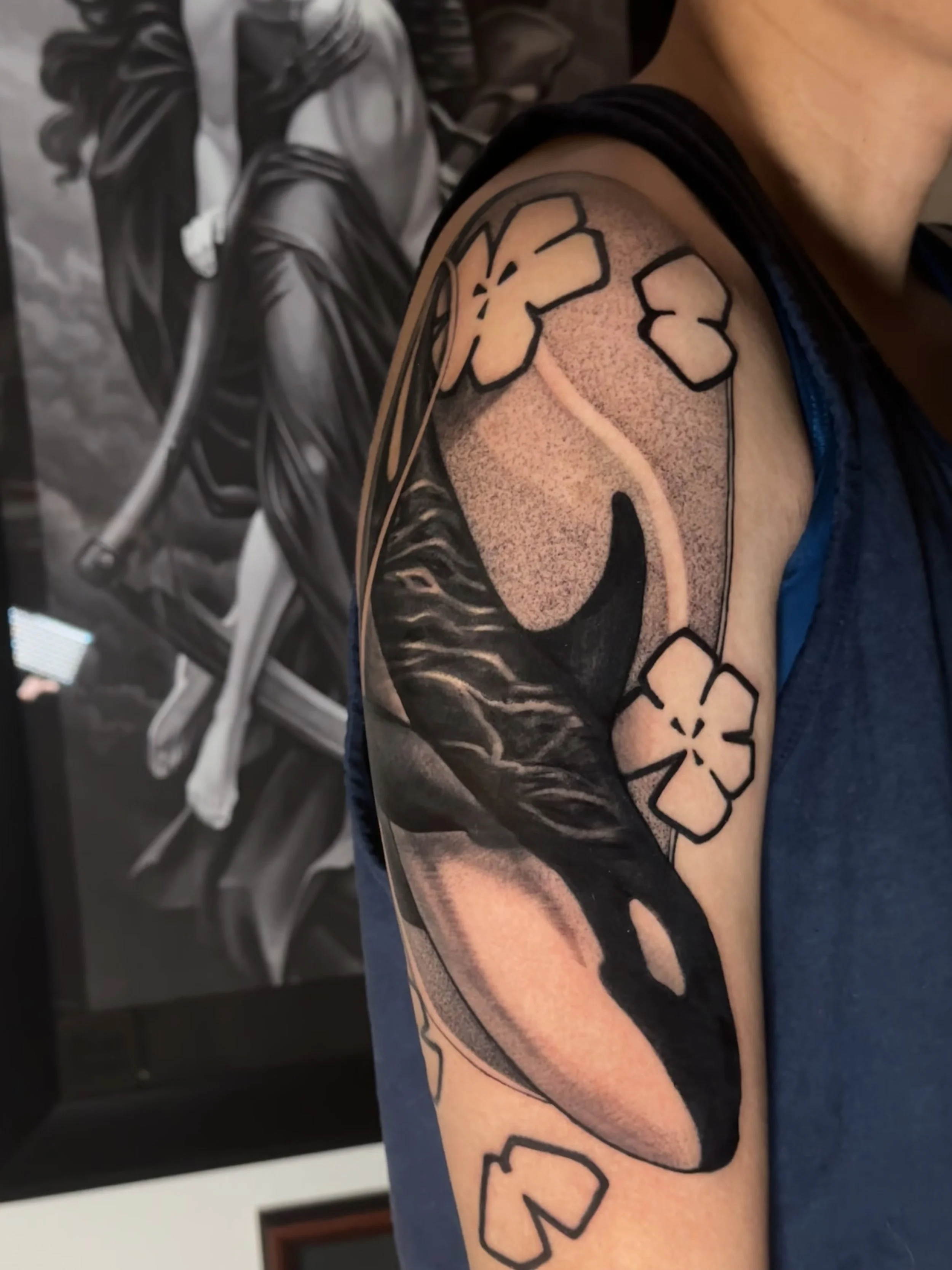 Illustrative tattoo of orca whale on upper arm by edgar rodriguez in colorado springs