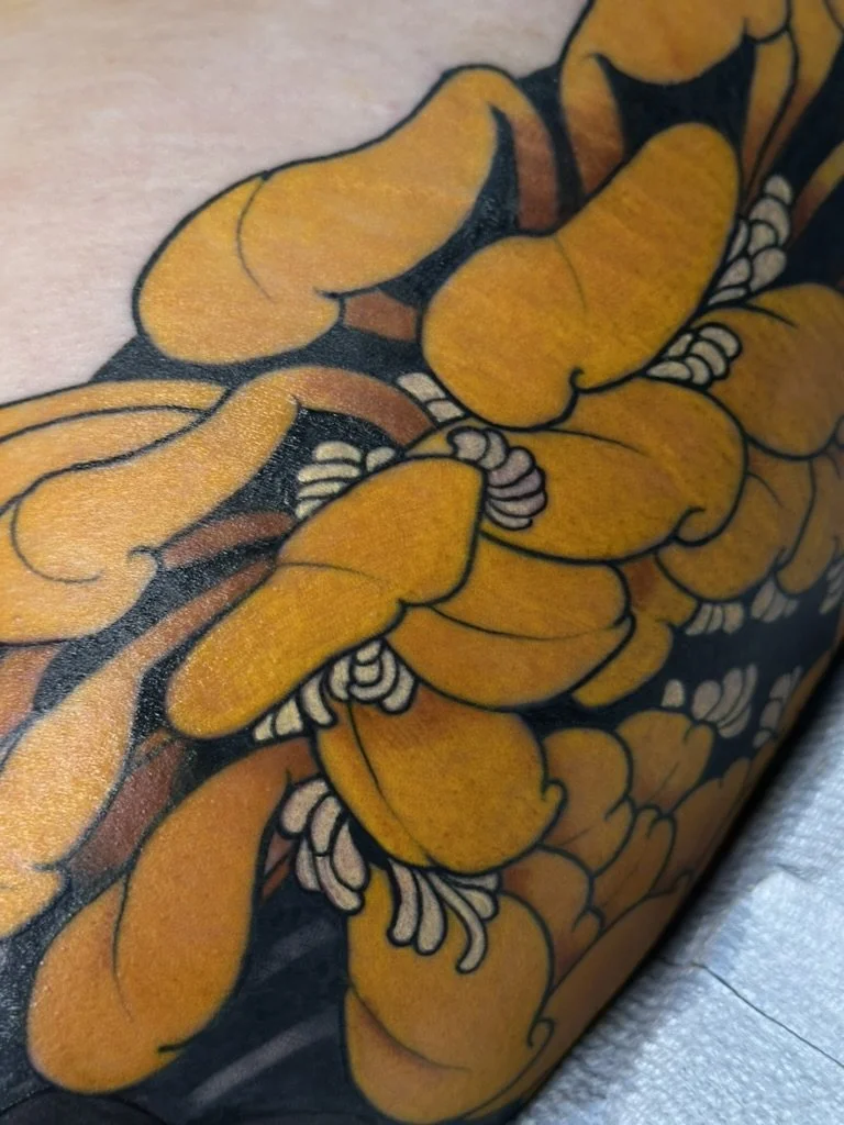 neo floral, yellow flower, orange flower, chrysanthemum, cover up tattoo, colorado springs, colorado