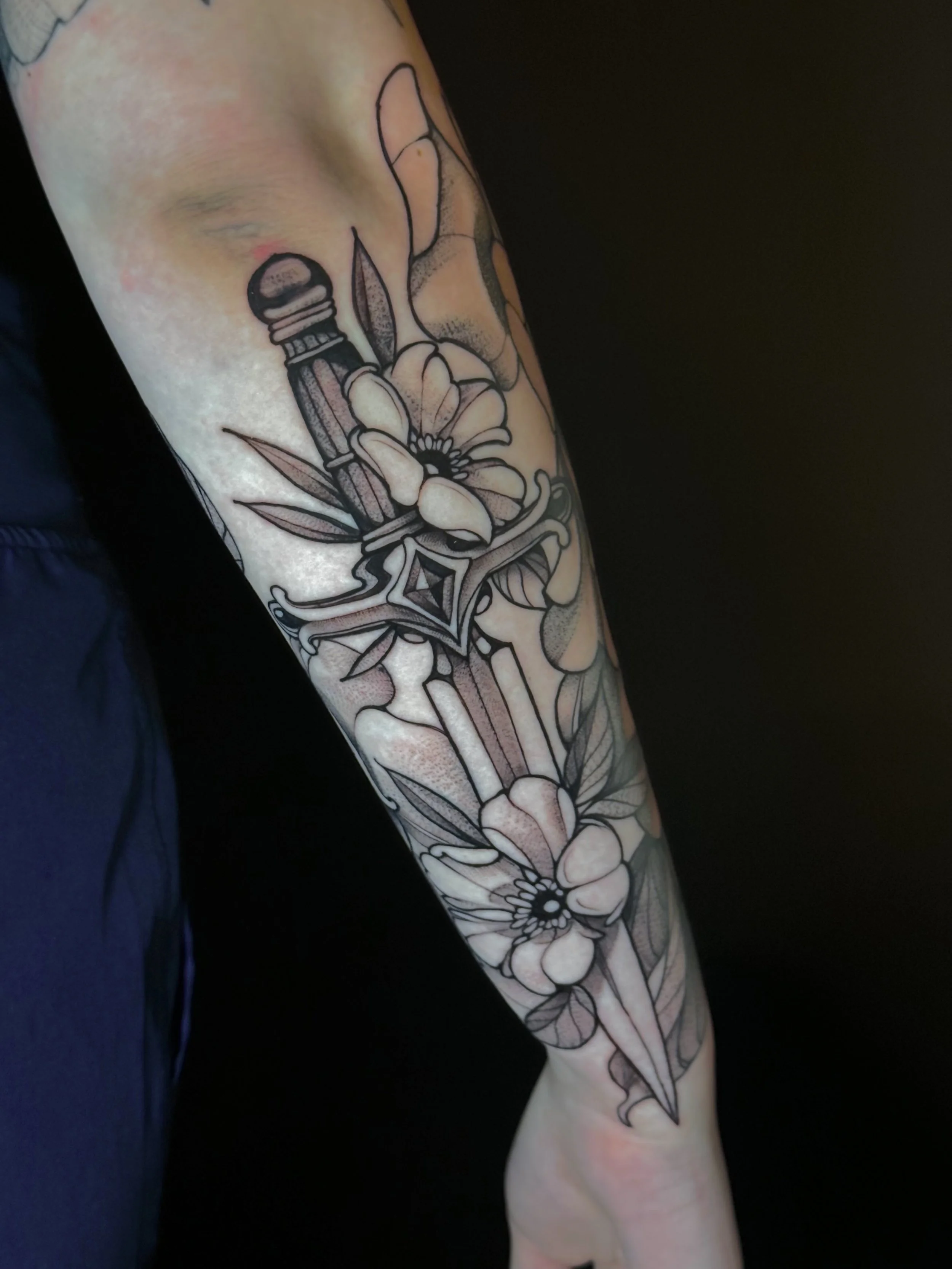Dagger tattoo, illustrative, neo traditional, black work, blossoms flowers, sword, blade Colorado Springs, Colorado