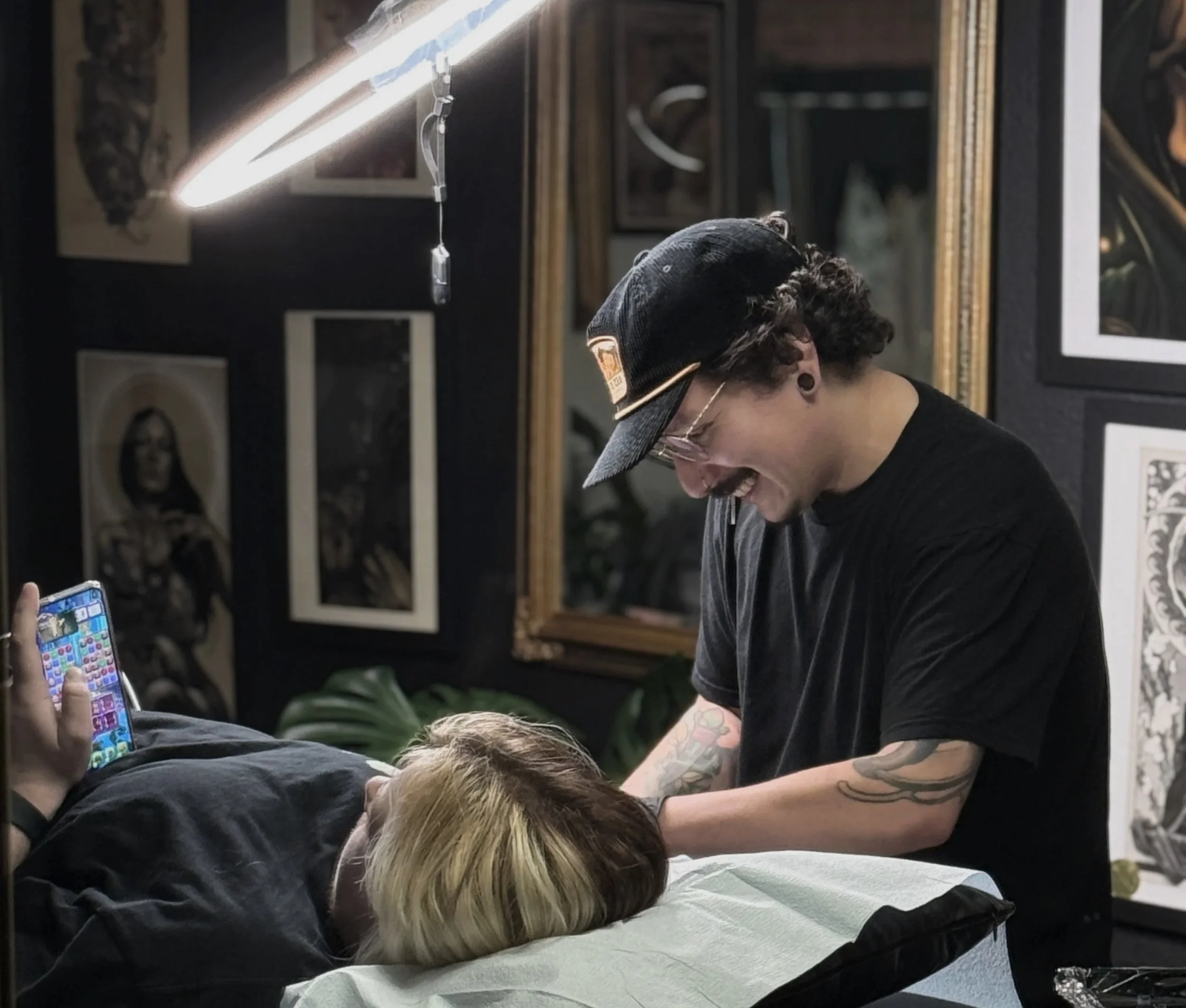 Edgar Rodriguez tattooing in his private studio in colorado springs