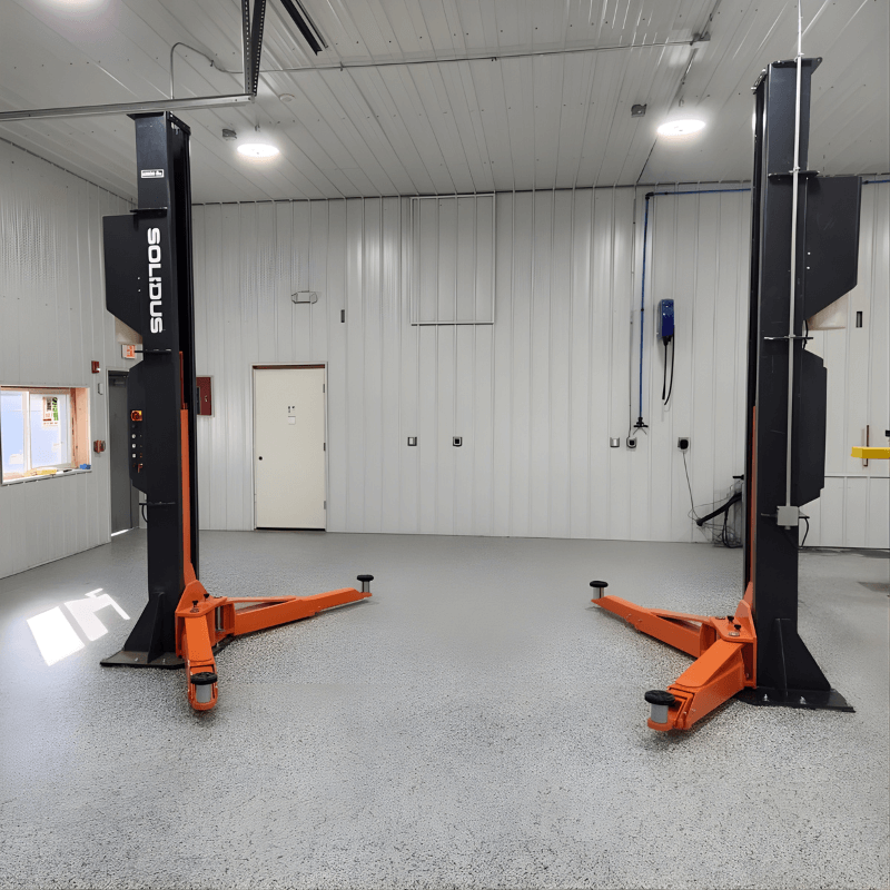 Two post lift used in auto body repairs shops