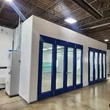 Enclosed paint booth designed for professional auto body repair
