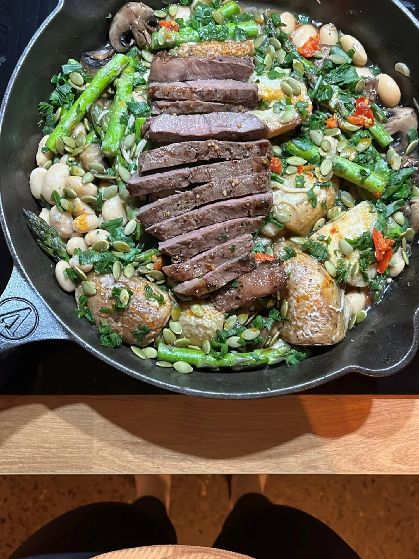 dinner last night - a small steak from @dirtycleanfood (yes he overcooked it but he did apologise) on a bed of veggies: asparagus, pre roasted potatoes (resistant starch = happy gut), swiss brown and enoki mushrooms, butter beans, garlic, topped with