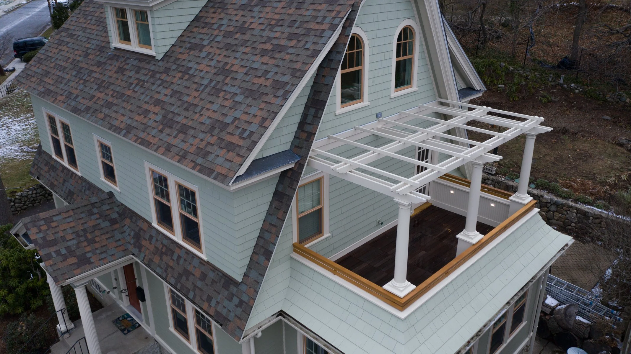 Aerial view of a whole-home remodel with siding replacements
