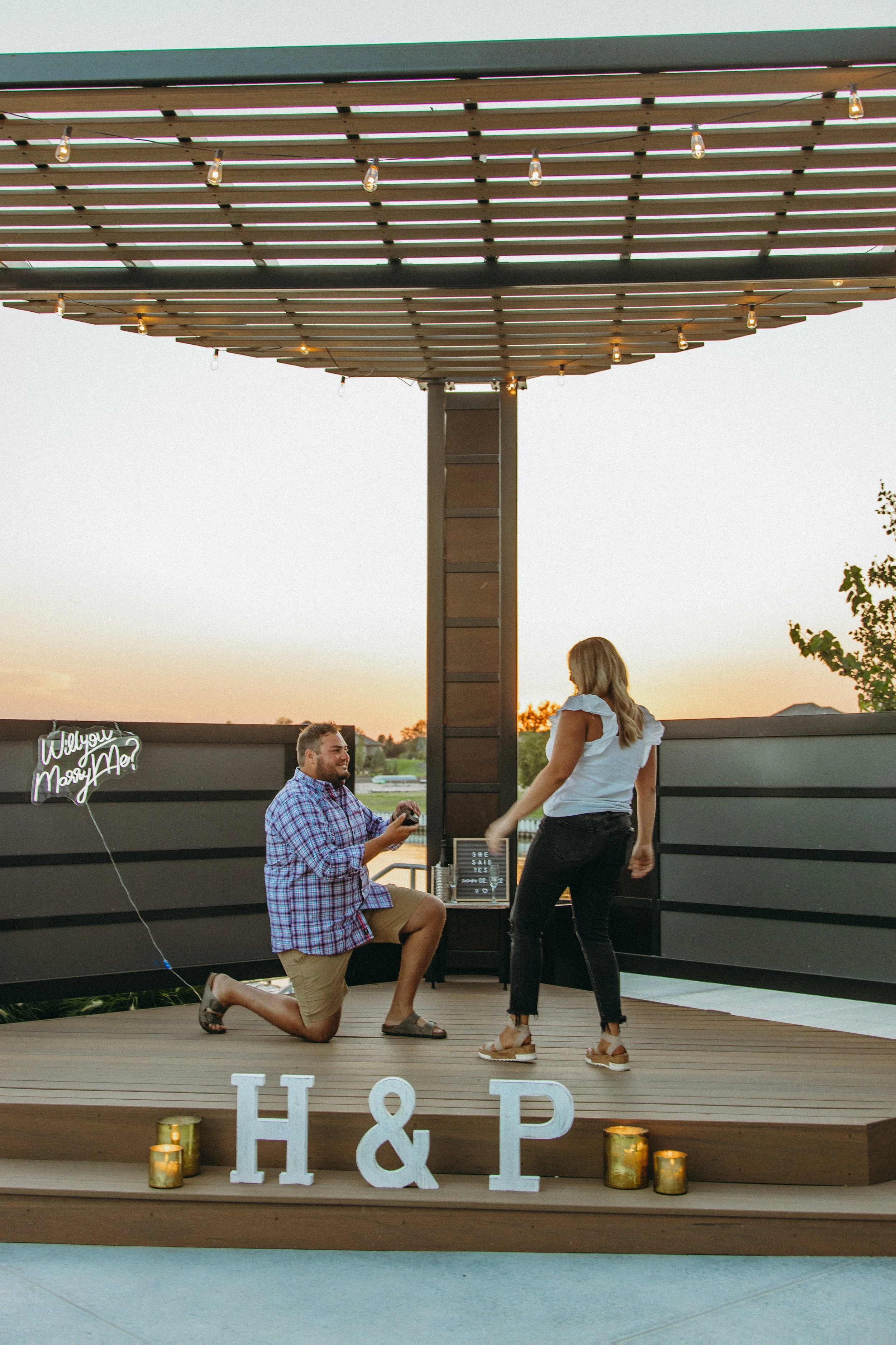 Sunset Surprise Proposal at A View West Shores | Heather &amp; Phil's Romantic Nebraska Engagement